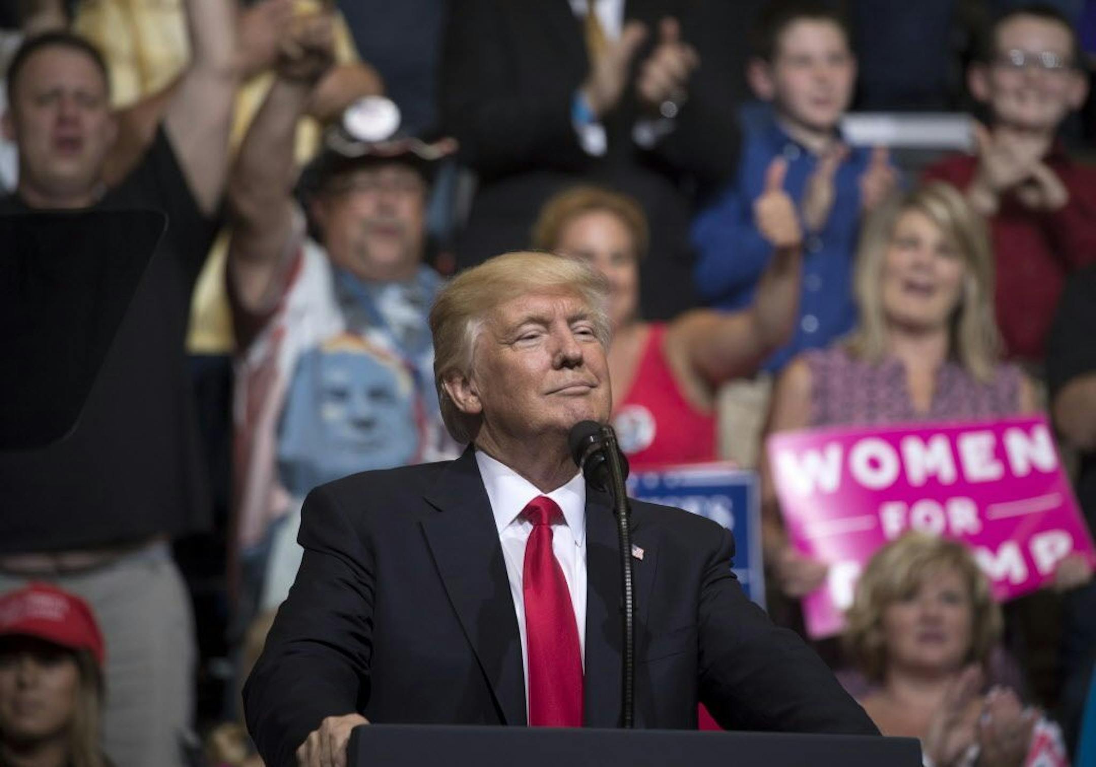 FILE-- President Donald Trump speaks during campaign-style rally in Cedar Rapids, Iowa, June 21, 2017. Trump appeared to acknowledge on Friday in an interview that his tweet hinting of taped conversations with James Comey was intended to influence the fired FBI director�s testimony before Congress, and he emphasized that he committed �no obstruction� of the inquiries into whether his campaign colluded with Russia.