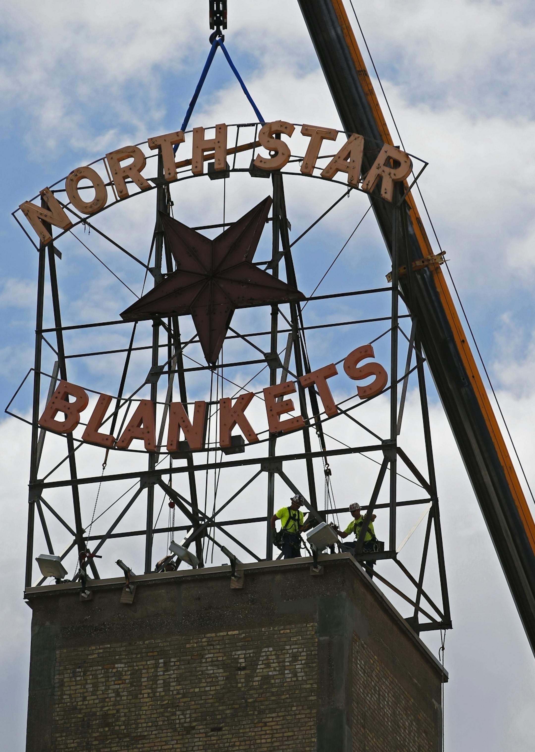 The North Star Blanket sign was removed to be restored as part of a larger effort to restore historic signs in the area.It has been decades since the neon has functioned, and in recent years the signs were lit with simple spotlights. Residents worried that the signs might fall off the building, and there was growing interest in trying to preserve them.