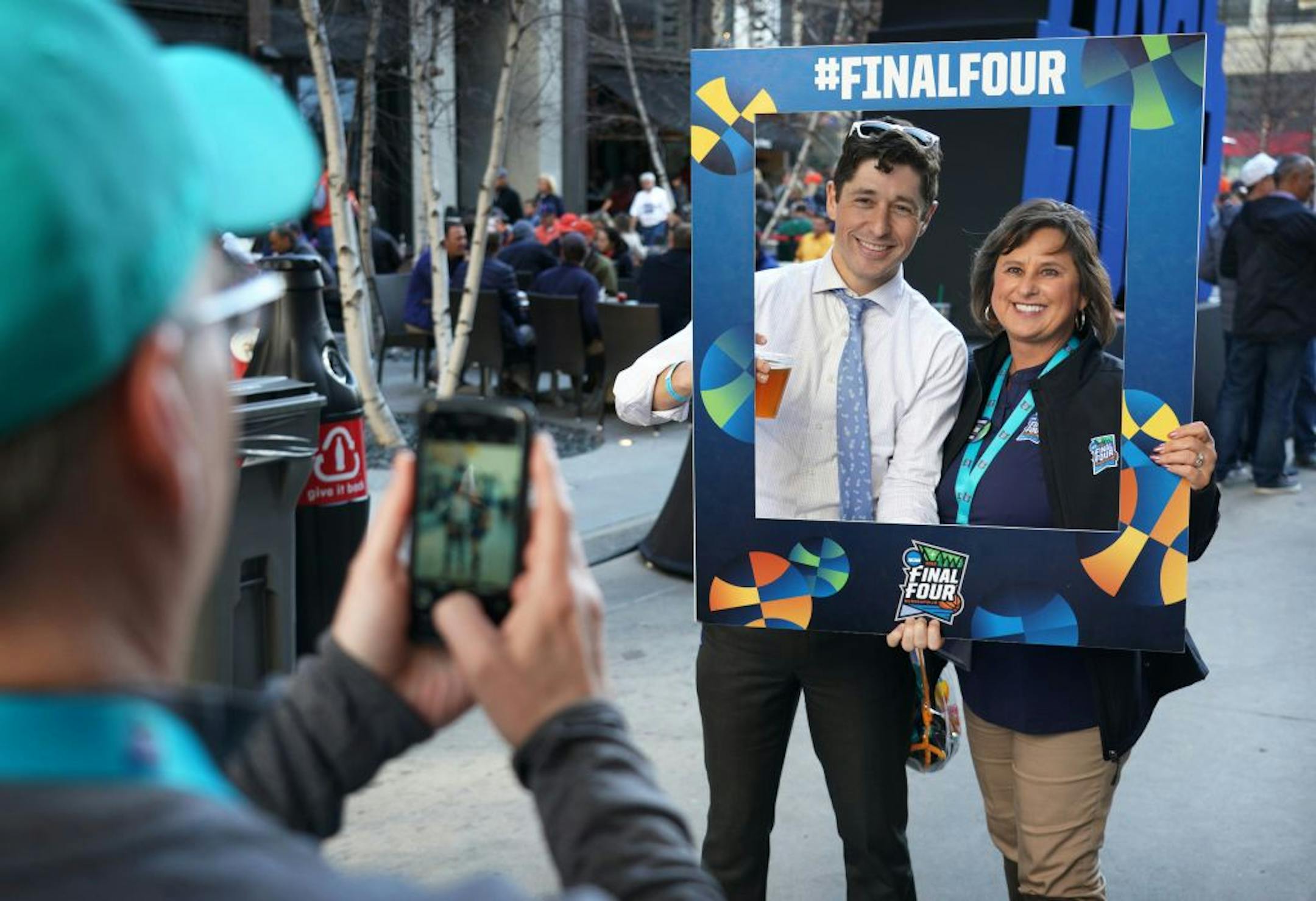 Minneapolis Mayor Jacob Frey posed for a picture with Final Four volunteer Lindy Corbin-Studt of Eagan during the Final Four Tip-Off Tailgate Party on Monday afternoon on Nicollet Mall.