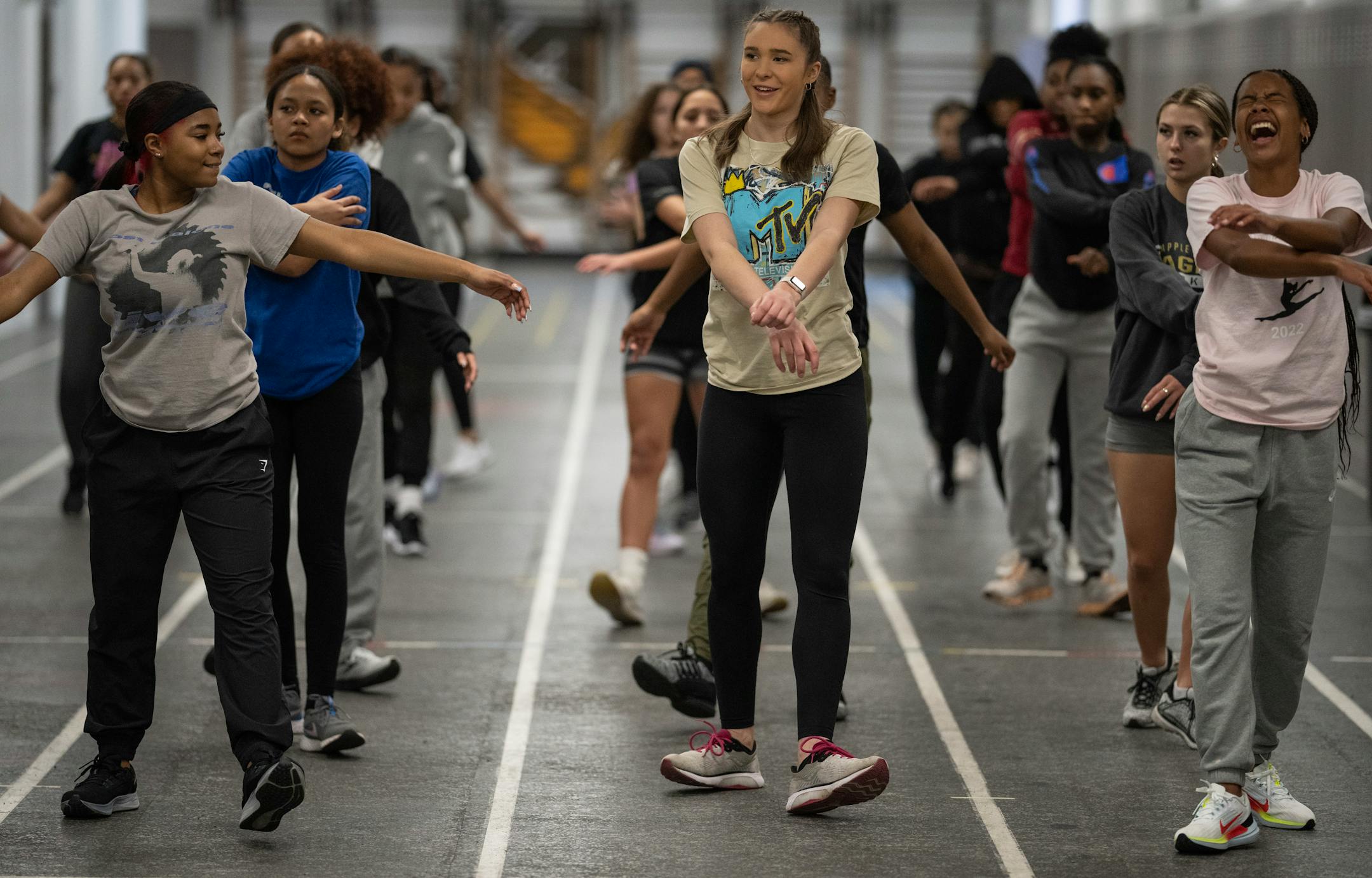 Members of the Apple Valley girls track and field team warmed up during practice.
