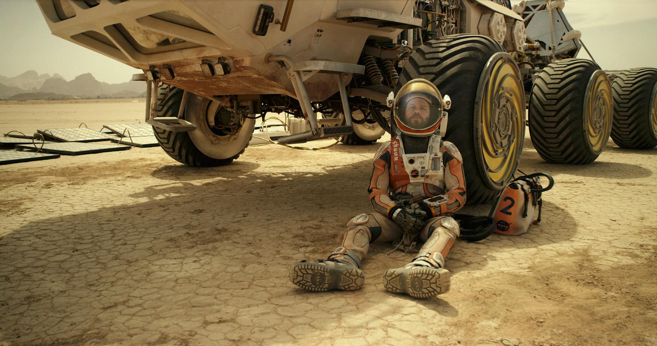 Matt Damon portrays an astronaut who faces seemingly insurmountable odds as he tries to find a way to subsist on a hostile planet.