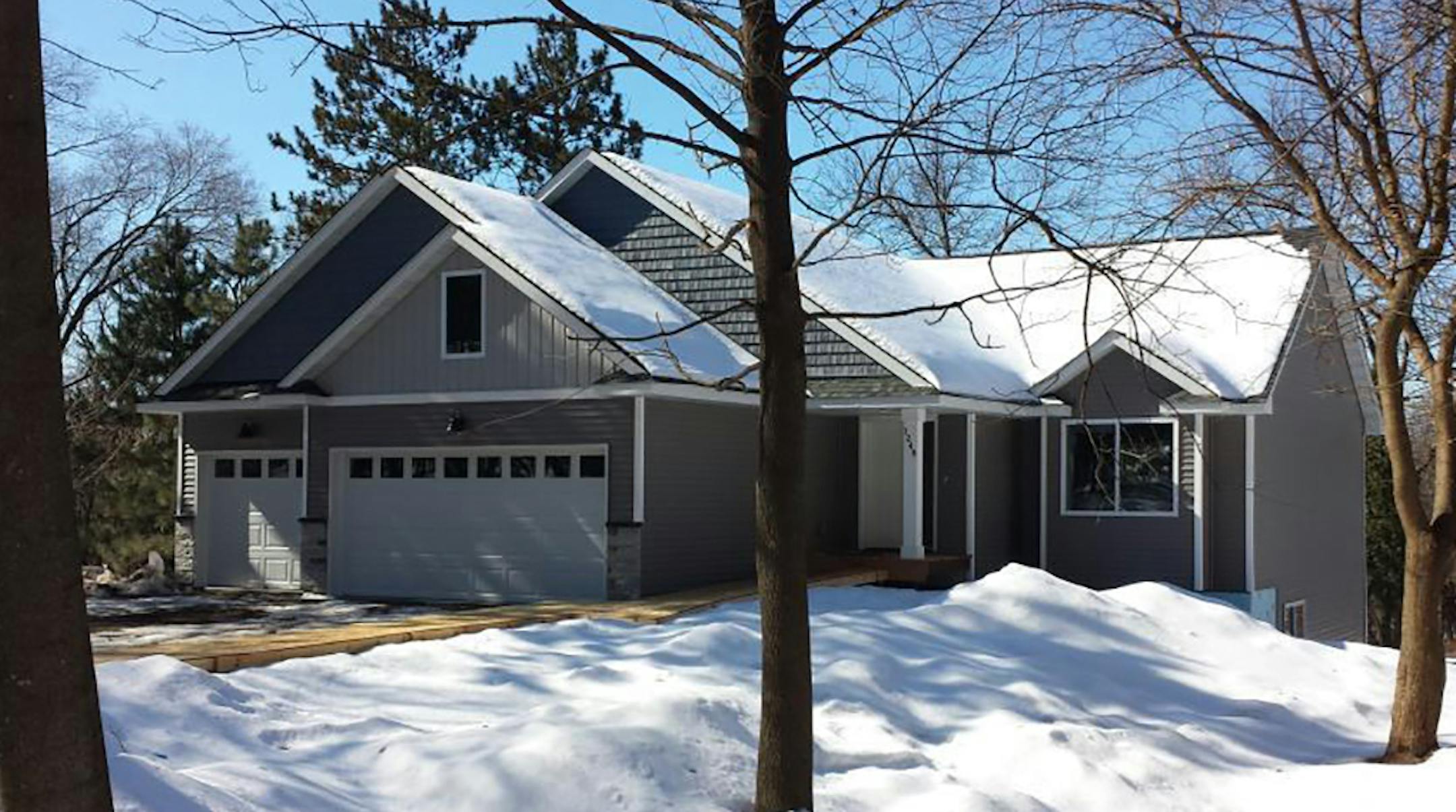 Newport: Built in 2019, this three-bedroom, two-bath house has 2,042 square feet and features three bedrooms on the main level, vaulted ceilings, fireplace hardwood floors, stainless steel kitchen appliances and full partially-finished basement. Listed by Steve Alsip, Keller Williams Realty Integrity-Edina, 612-328-8918.