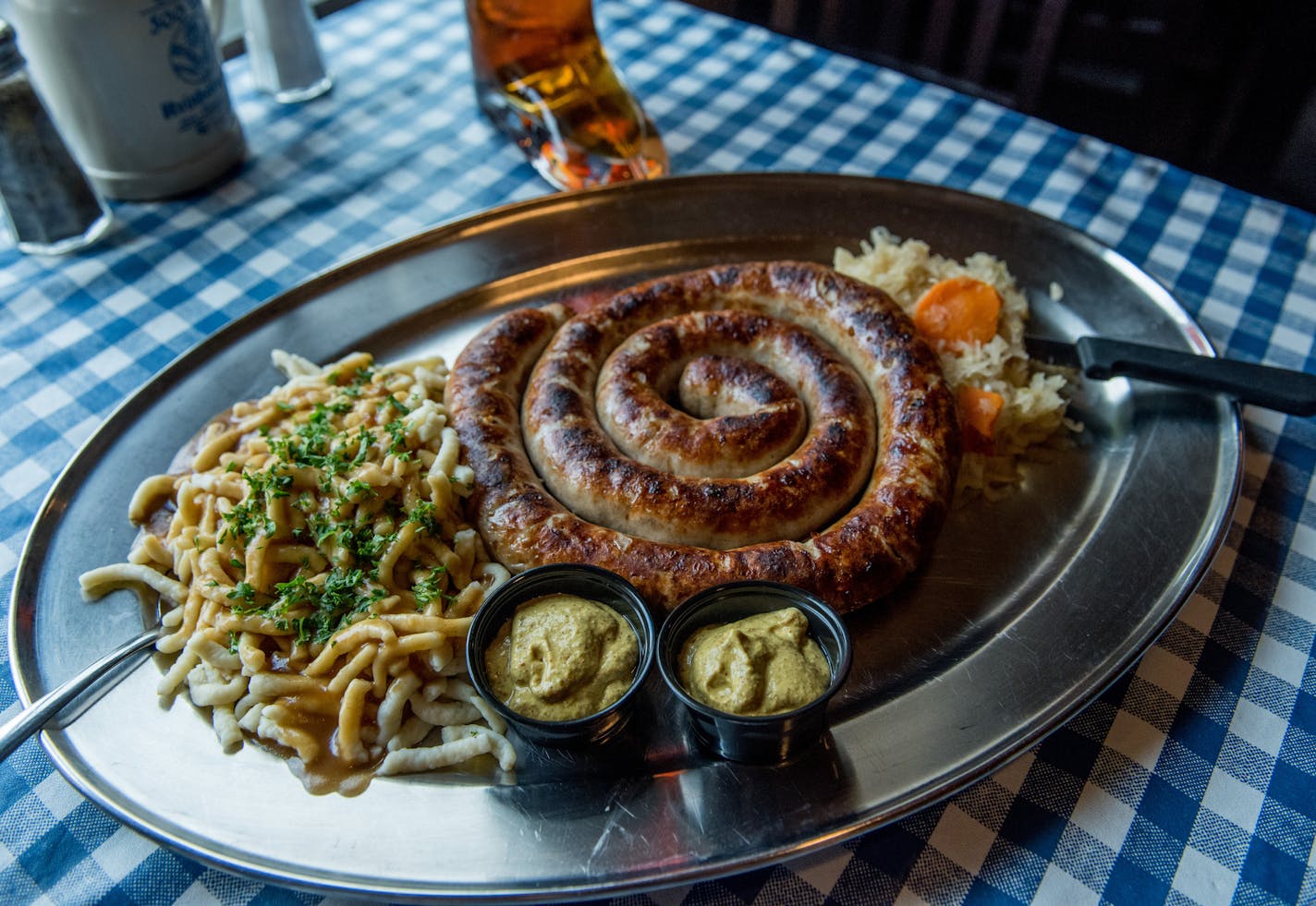 ] MARK VANCLEAVE &#xef; mark.vancleave@startribune.com * The Gigantic Meterbratwurst Gasthof is exactly what it sounds like&#xf1;served with two sides. Boot of beer strongly recommended. Photographed July 18, 2017 at Gasthof Zur Gemutlichkeit in Minneapolis.