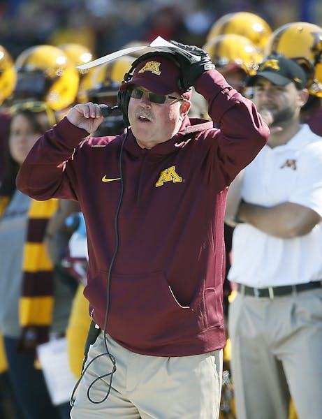 Gophers head coach Jerry Kill watched his team before a second quarter touchdown as the Minnesota Gophers took on the Northwestern Wildcats at TCF Sta