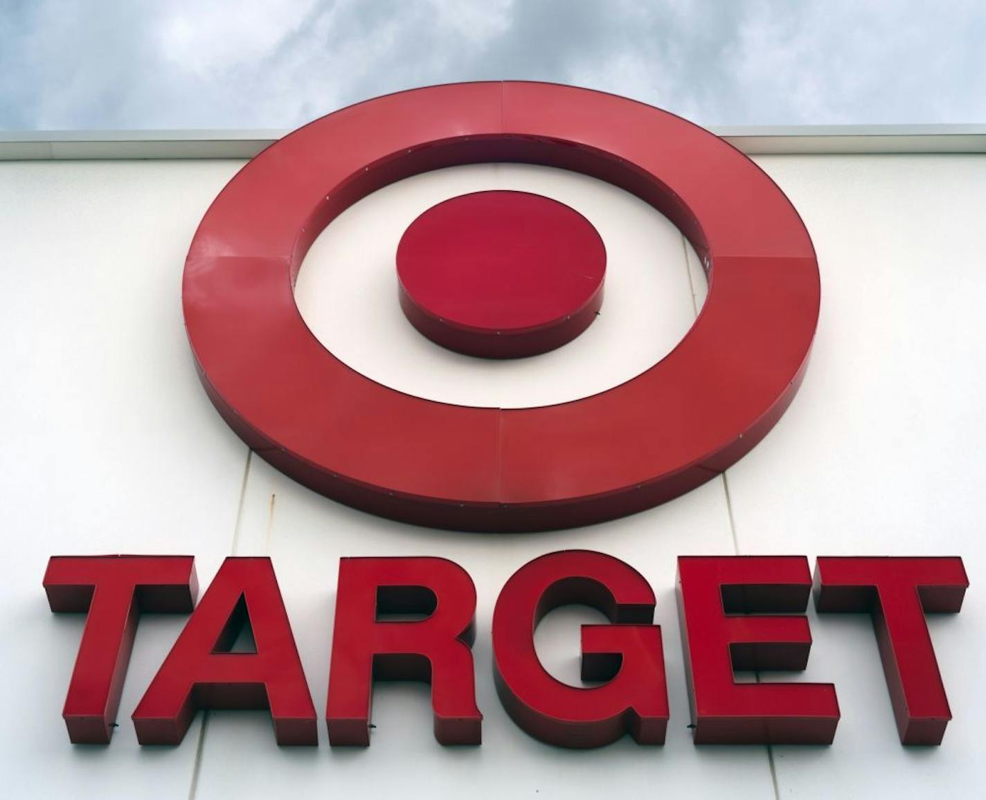 FILE - This Wednesday, May 3, 2017, file photo shows a Target store in Omaha, Neb. Target plans to boost its same-day delivery capability by paying $550 million for Shipt, its latest move to try to catch up with Amazon. The deal is expected to close before the end of 2017.