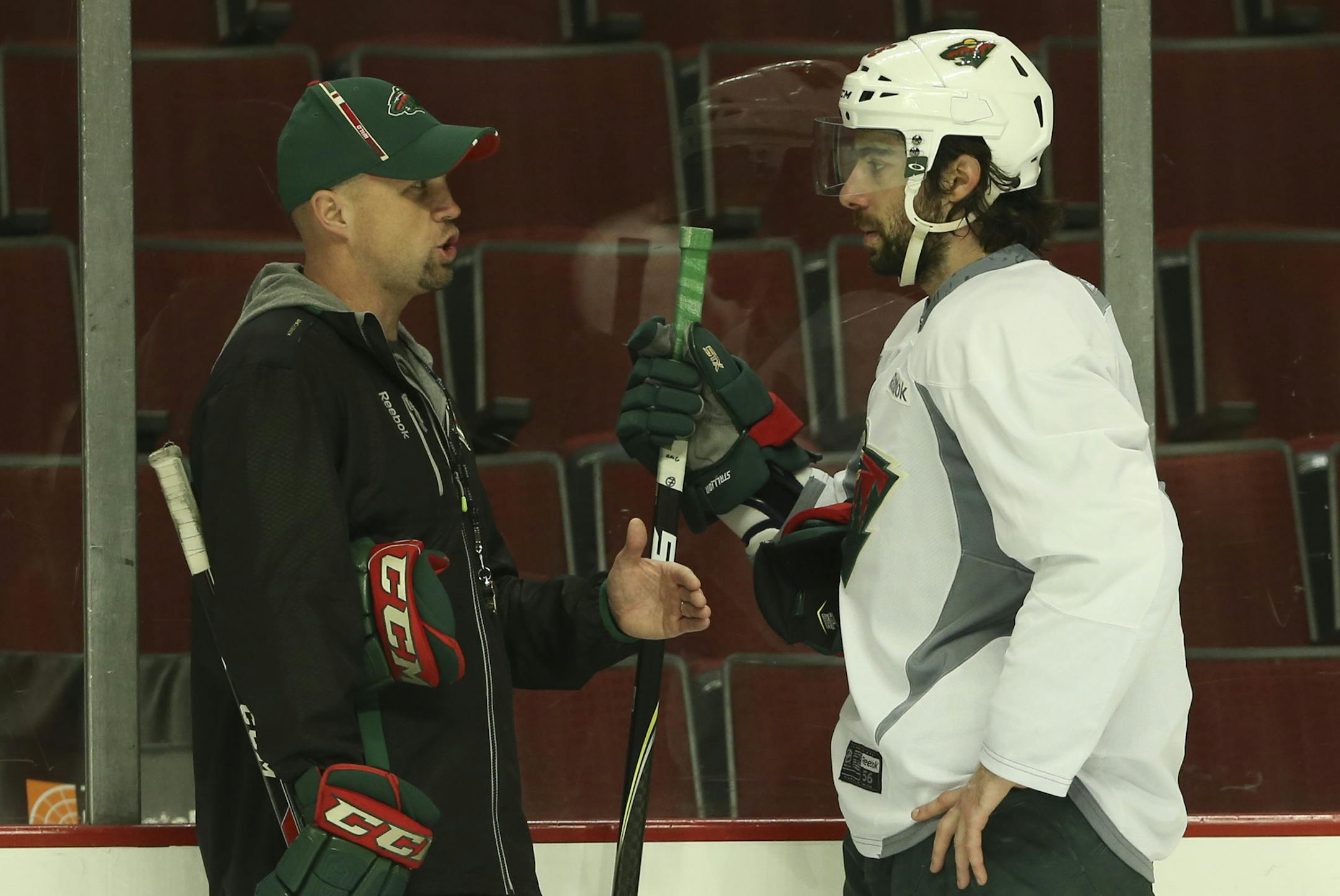 Minnesota Wild head coach Mike Yeo had a one on one talk with Minnesota Wild left wing Matt Moulson (26) during practice Saturday afternoon at United Center in Chicago. ] JEFF WHEELER ‚Ä¢ jeff.wheeler@startribune.com The Minnesota Wild practiced at United Center in Chicago Saturday afternoon, the day after their loss to the Chicago Blackhawks.