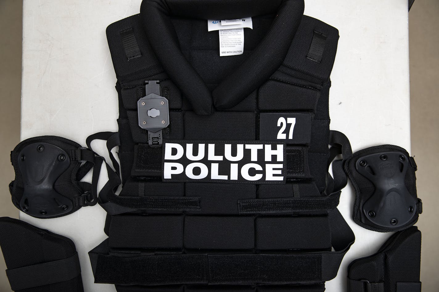 A chest protector, elbow and forearm protector sat out to display new pieces of Duluth police riot gear. The chest protector includes numbers for identification by the public as well as a mount for a body camera. ]
ALEX KORMANN &#x2022; alex.kormann@startribune.com The Duluth police department has 125 new complete sets of riot gear with an emphasis on transparency of officers.