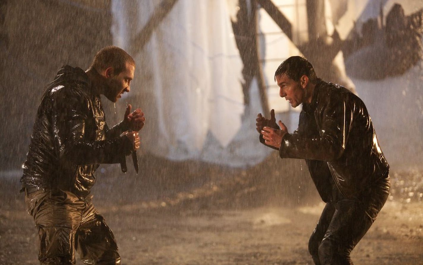 Jai Courtney as Charlie and Tom Cruise as "Jack Reacher."