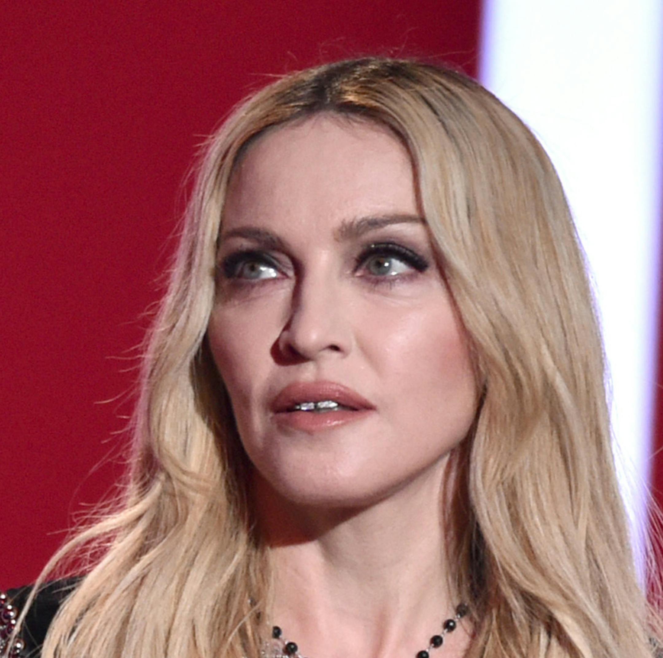 FILE - In this Sunday, March 29, 2015 file photo provided by iHeartRadio, Madonna speaks at the iHeartRadio Music Awards at The Shrine Auditorium, in Los Angeles. Madonna, Rihanna, Beyonce and Jay Z are among the A-List musicians who are co-owners of the streaming service Tidal. Kanye West, Daft Punk, Alicia Keys, Jack White and Nicki Minaj also announced that they are co-owners of the streaming service at an event Monday, March 30, 2015, in New York City. (AP Photo/iHeartRadio, John Shearer)