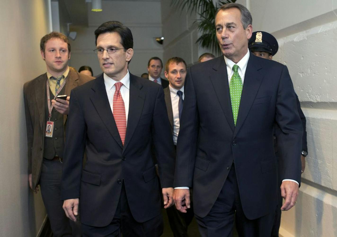 House Majority Leader Eric Cantor, R-Va., left, and Speaker of the House John Boehner, R-Ohio, arrive to a second Republican caucus meeting at the U.S. Capitol in Washington, on Tuesday, Jan. 1, 2013.