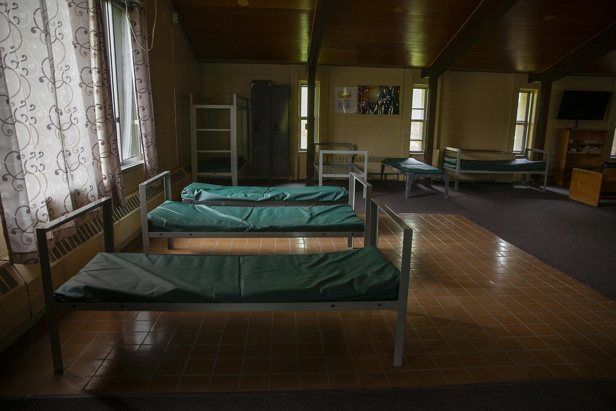 Beds sit empty in a large dorm at the Boys Totem Town facility Friday, May 24, 2019. Boys Totem Town will soon close its doors as part of a larger juvenile justice trend away from out-of-home placements in favor of community programs.