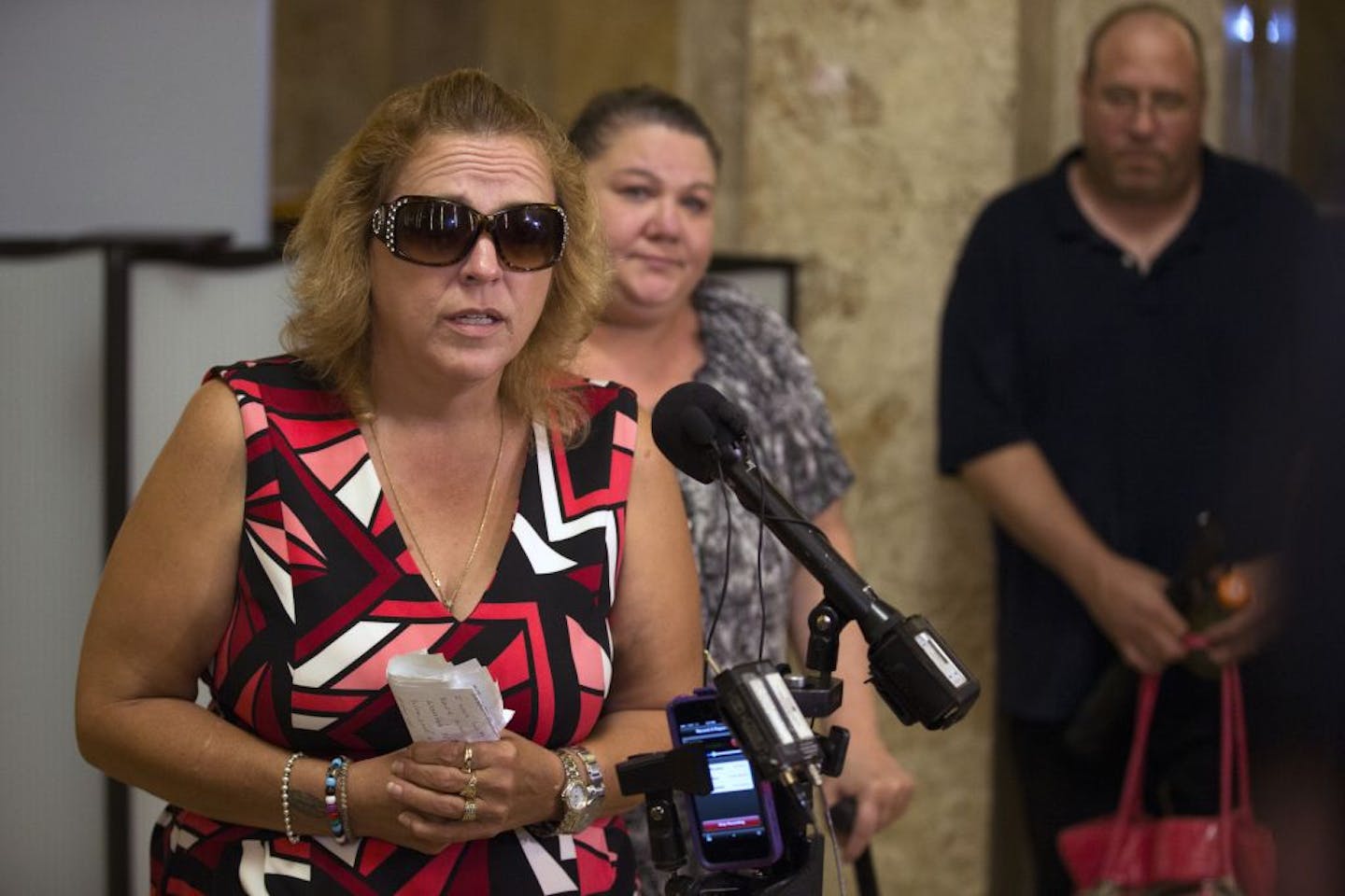 Jennifer Cleven, the girlfriend of Todd Stevens, speaks to the media after a jury found Neal Zumberge guity of first-degree murder in the shooting death last year of Todd Stevens.