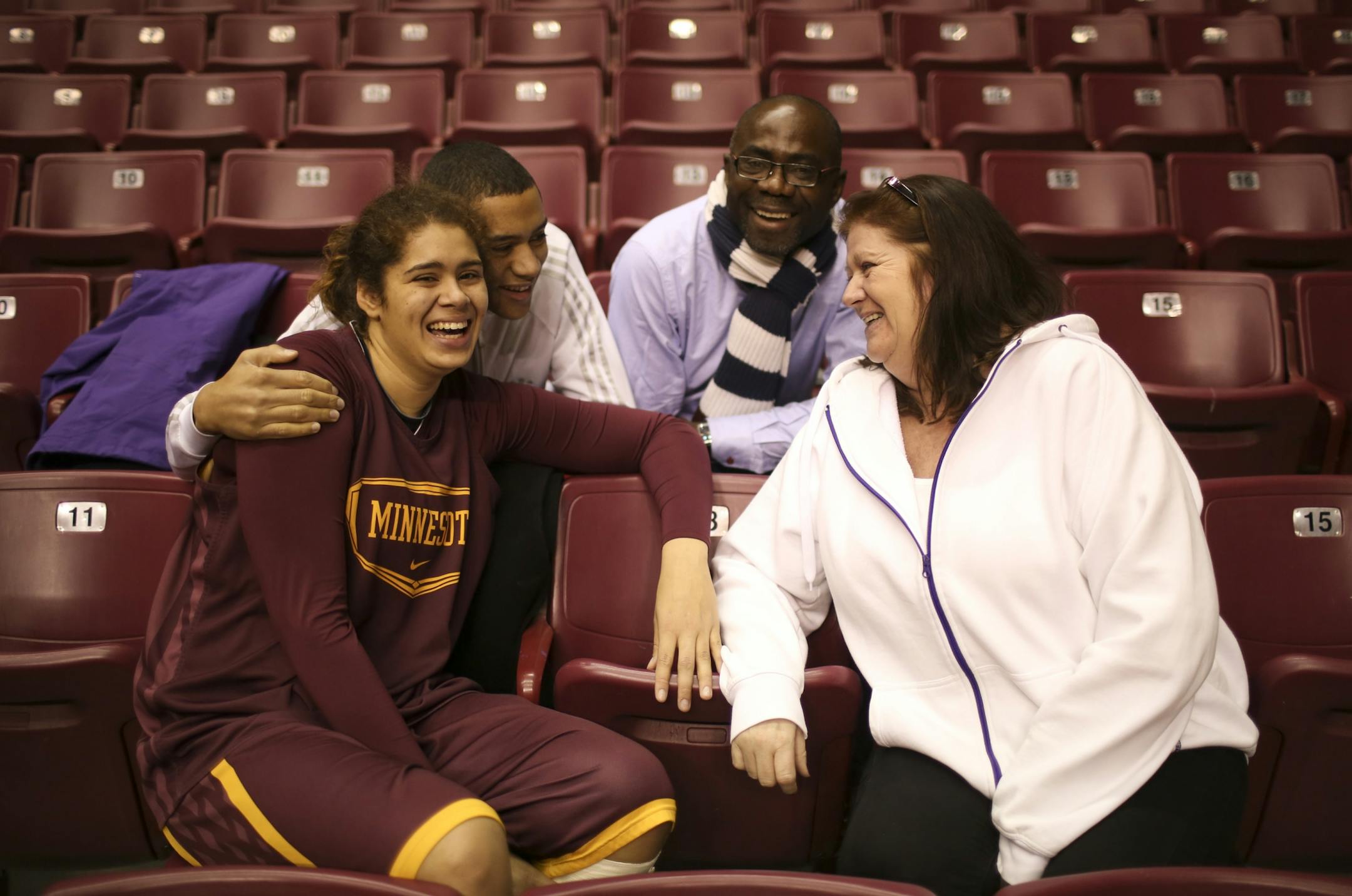 The Gophers' 6-5 center Amanda Zahui B.'s family are visiting her from Stockholm, Sweden this week. Amanda Zahui B. with her brother, Aaron, 17, and parents Alex and Ann-Sofi Zahui Bazoukou after they watched her practice Wednesday afternoon, December 18, 2013 at Williams Arena.