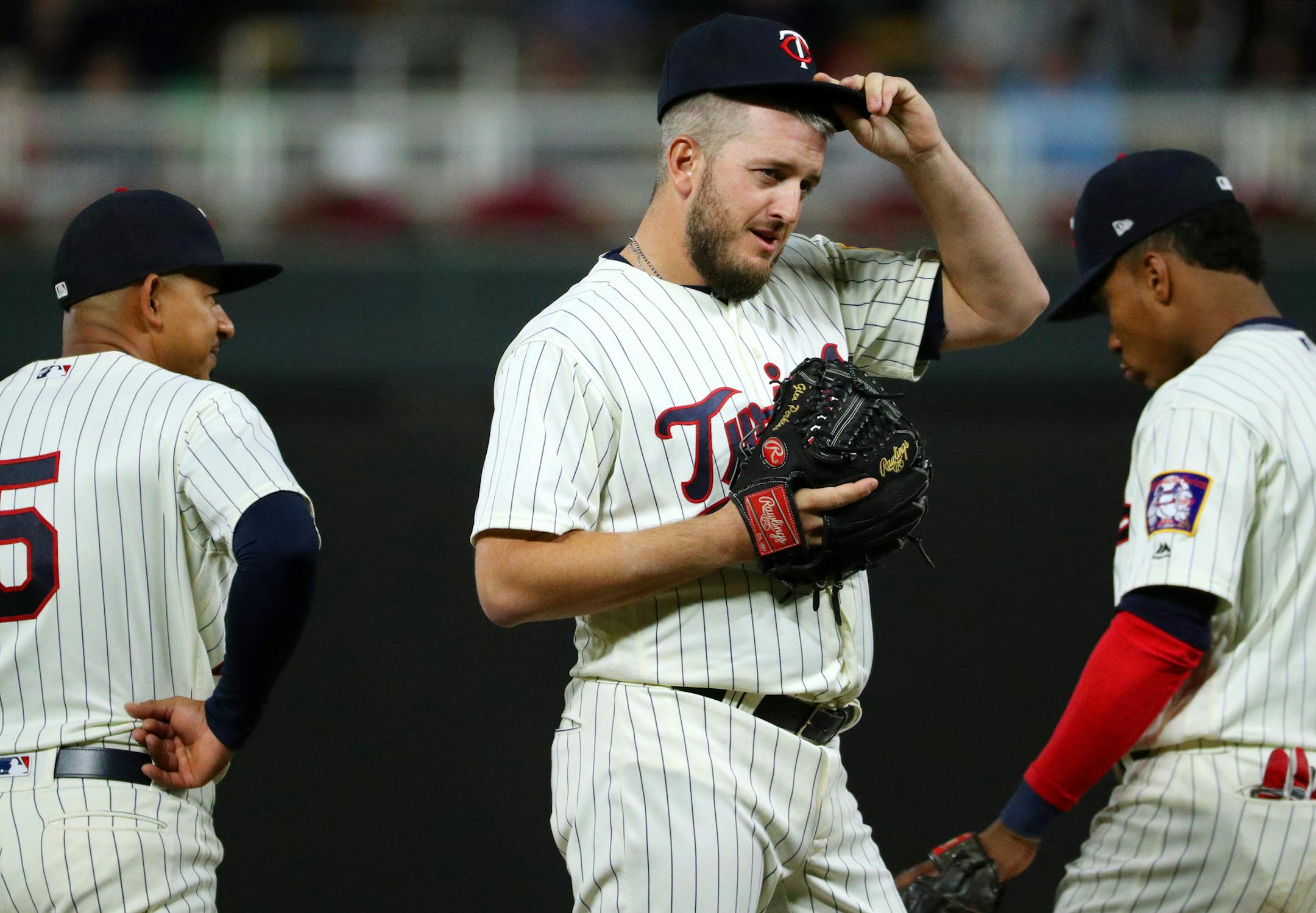 Minnesota Twins relief pitcher Glen Perkins (15) replaced Minnesota Twins relief pitcher John Curtiss (27) in the ninth inning. ] ANTHONY SOUFFLE ï anthony.souffle@startribune.com Action from an MLB game between the Minnesota Twins and the Detroit Tigers Saturday, Sept. 30, 2017 at Target Field in Minneapolis.
