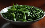 A trio of peas -- snow peas, sugar snaps and English -- mix together for a bountiful springtime bowl. After a quick dunk in boiling water, they need j