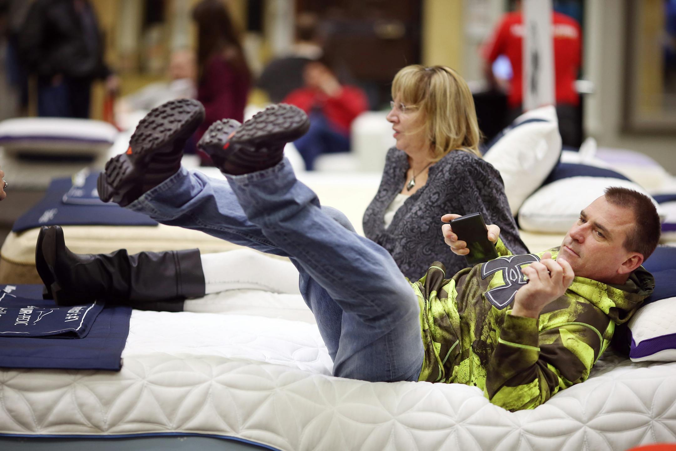 Tracy Zins right and his girlfriend Teri Bauer checked out at bed at the Mattress Firm booth during the Home and the Garden Show at the Minneapolis Convention Center Sunday March 6, 2016 in Minneapolis, MN. ] Jerry Holt/Jerry.Holt@Startribune.com