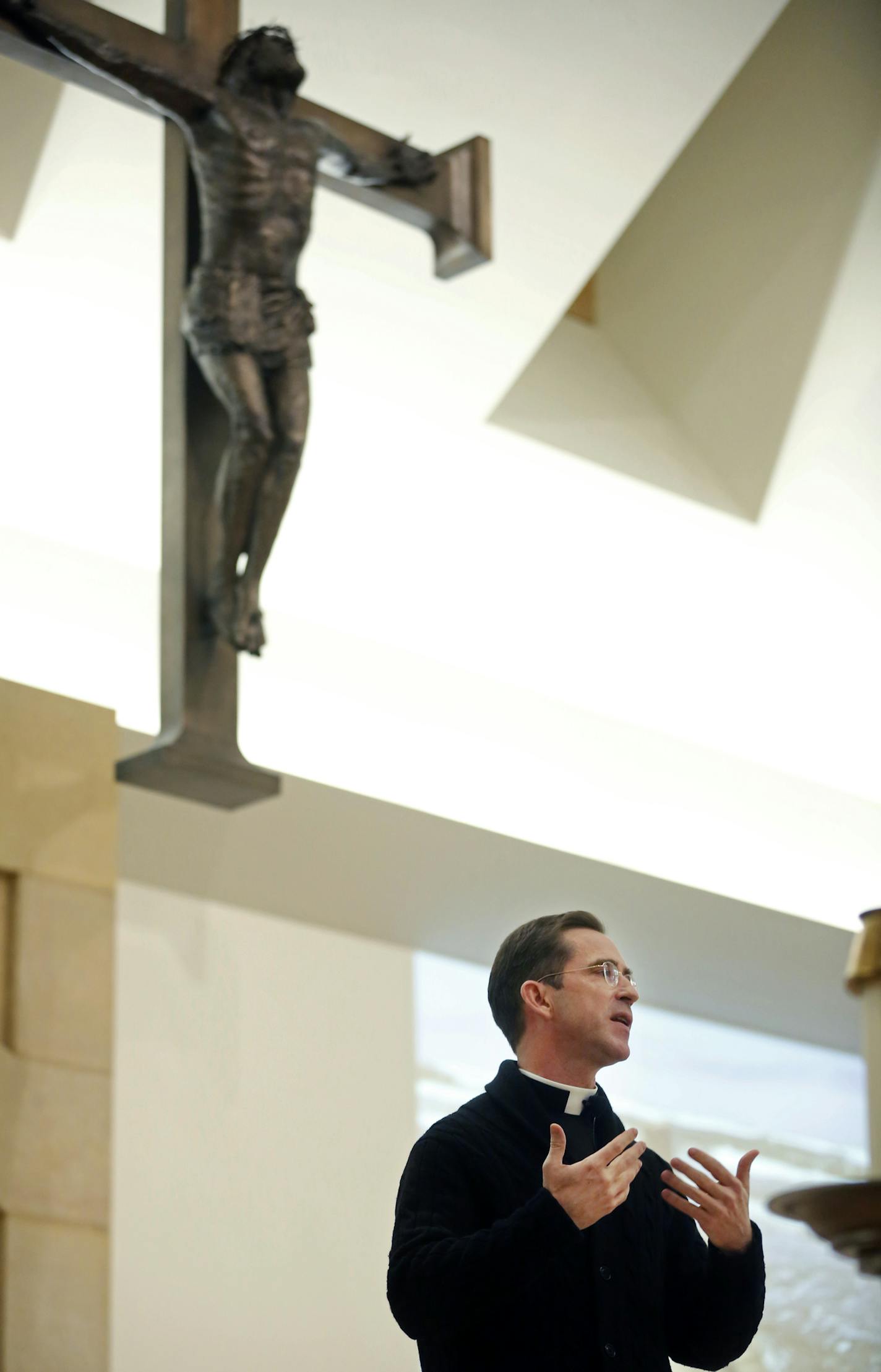 At Our Lady of Grace Catholic Church in Edina, Father Peter Laird, who is the Vicar General of the Archdiocese of St. Paul, spoke to a an overflow crowd about Catholics needing to create a deeper relationship with God.] rtsong-taatarii@startribune.com