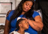 George Floyd's daughter Gianna Floyd, 6, looks to her mother Roxie Washington during a press conference at Minneapolis City Hall. ]  LEILA NAVIDI • leila.navidi@startribune.com