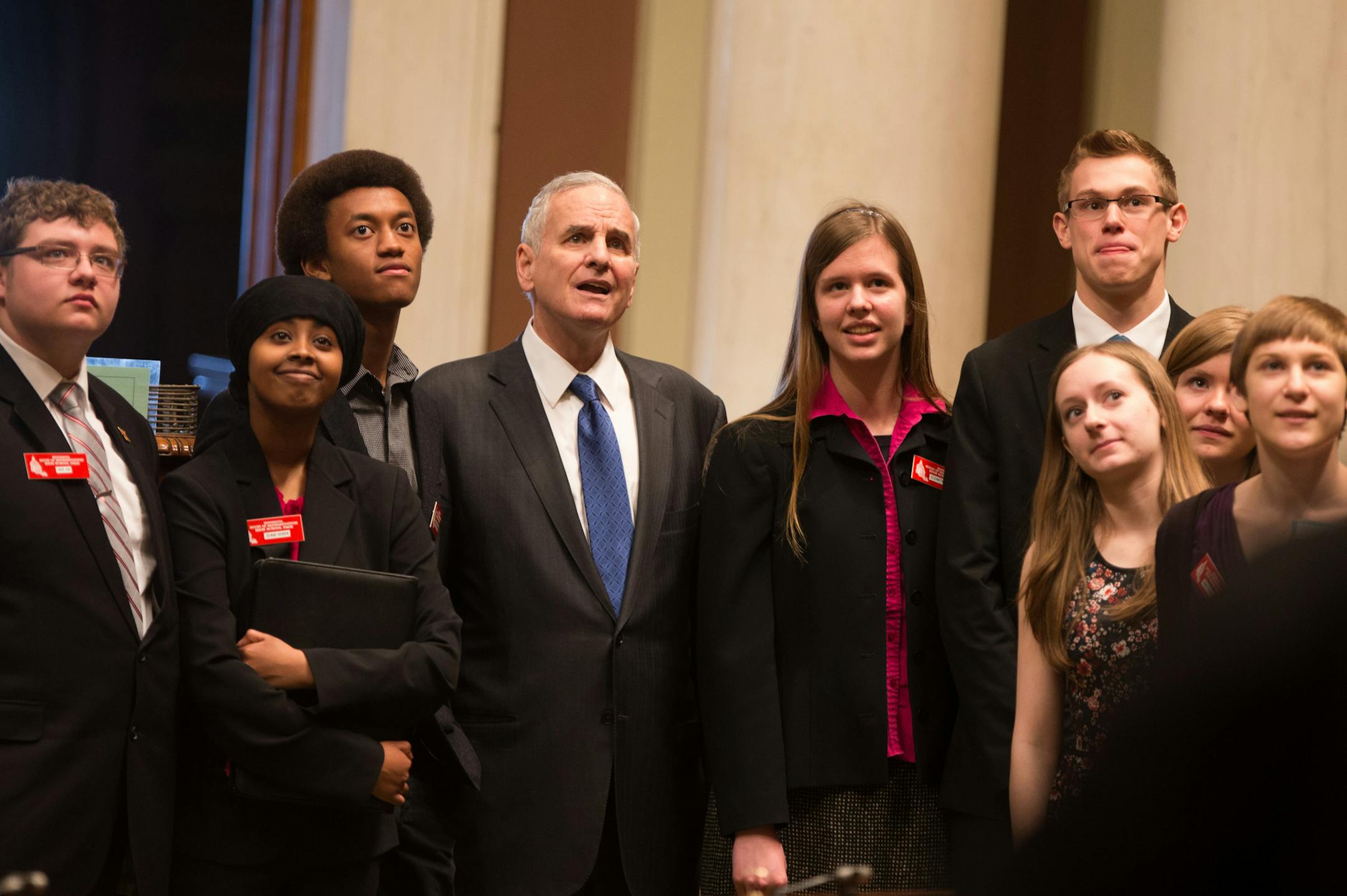 Governor Mark Dayton posed for a photo with a group of high school pages in the House chambers Monday, Feb. 16, 2015. Next door in the Senate Majority Leader Tom Bakk spoke about their recent dust-up over the Governor's proposed raises for his commissioners. ] Mark Vancleave - mark.vancleave@startribune.com *