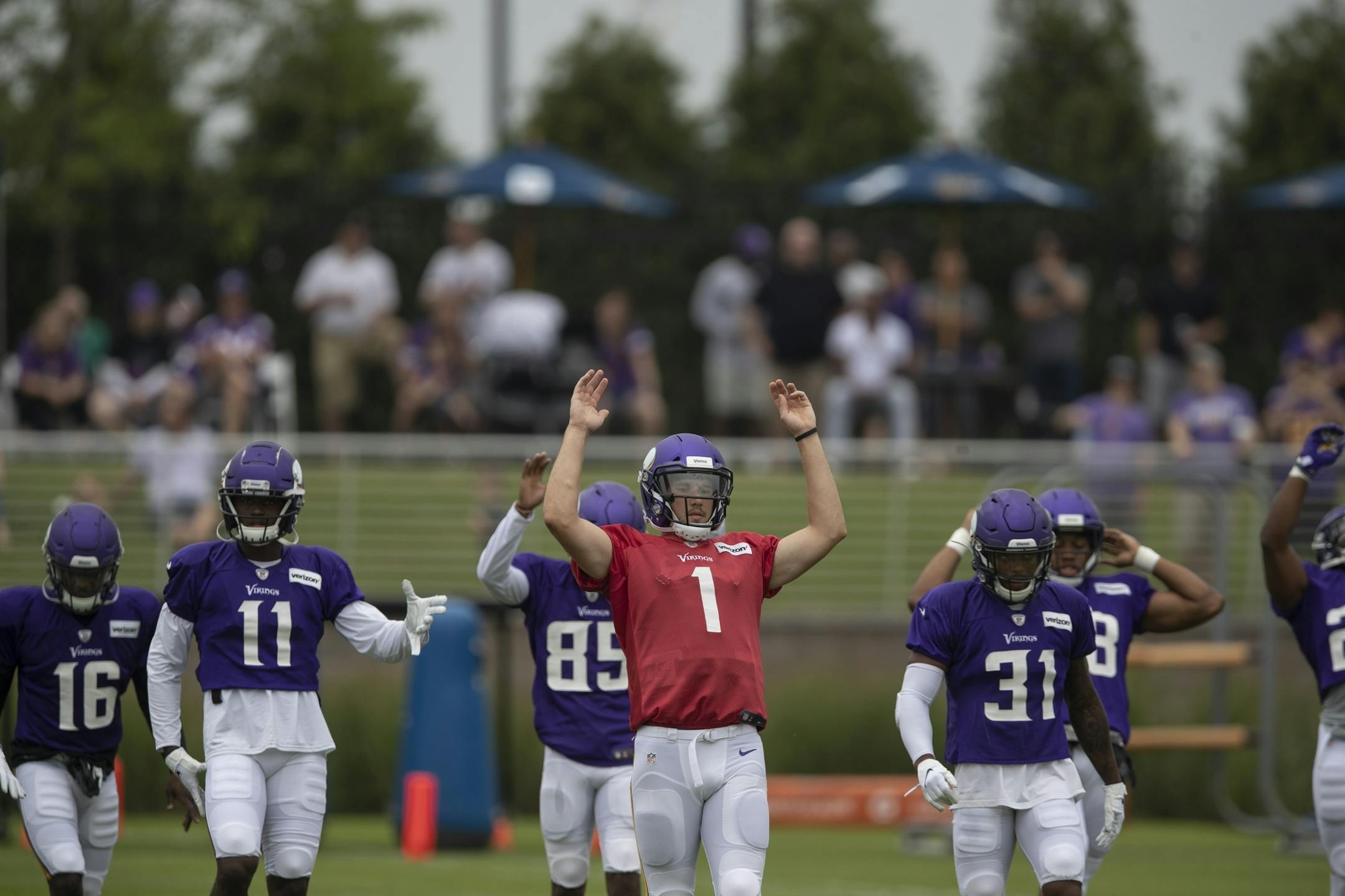 Minnesota Vikings quarterback Kyle Sloter (1) warmed up with teammates at TCO Performance Center on Sunday July, 28 2019 in Eagan, MN.