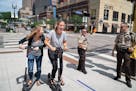 Sophie Konewko and Megan Albers took two Bird scooters for a ride through downtown Minneapolis in July 2018.