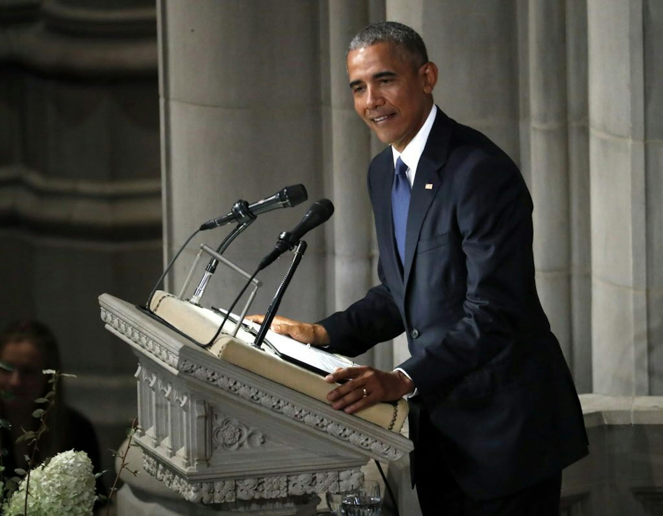 Former President Barack Obama speaks at a memorial service for Sen. John McCain today at Washington's National Cathedral.