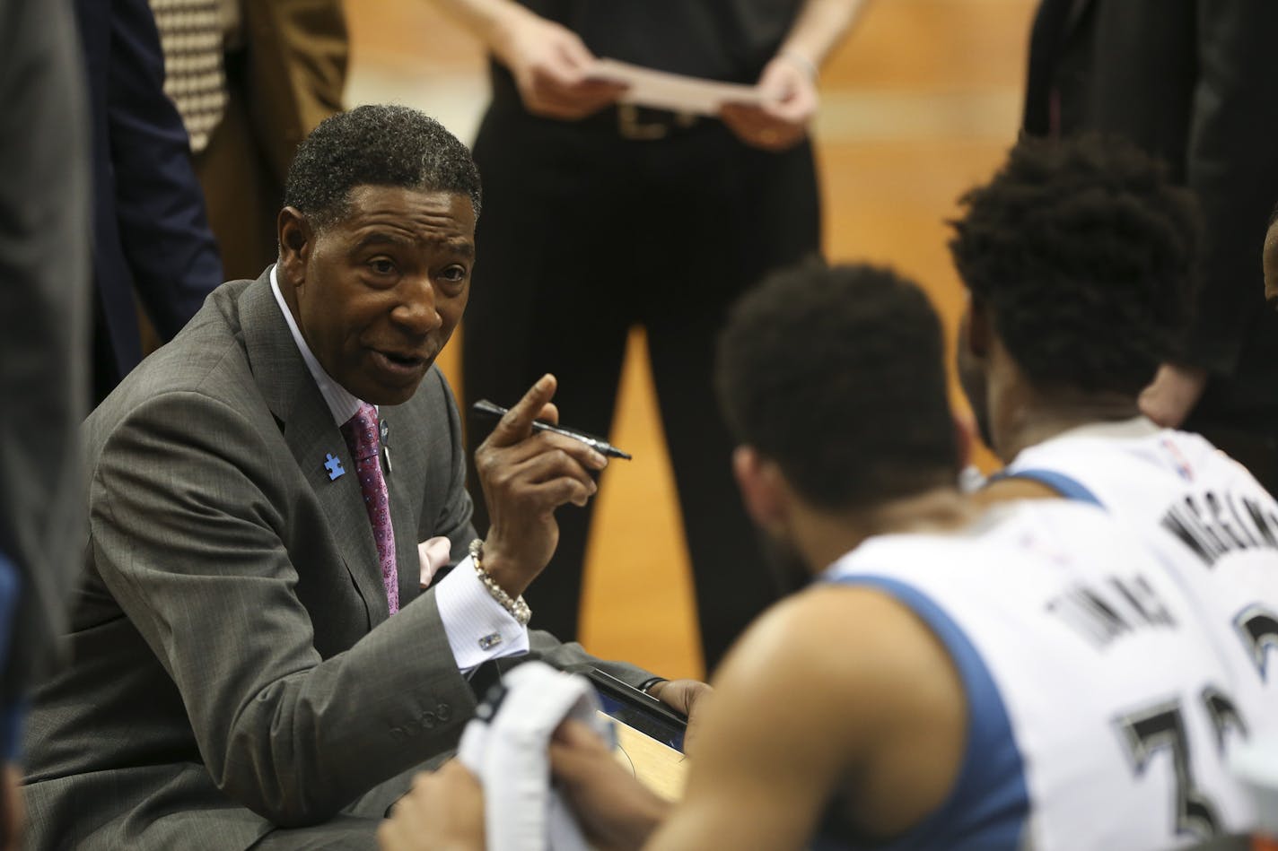 Timberwolves head coach Sam Mitchell made a point with Timberwolves center Karl-Anthony Towns (32) during a timeout in the second quarter Sunday afternoon. ] JEFF WHEELER &#xef; jeff.wheeler@startribune.com The Minnesota Timberwolves hosted the Dallas Mavericks in an NBA basketball game Sunday afternoon, April 3, 2016 at Target Center in Minneapolis.