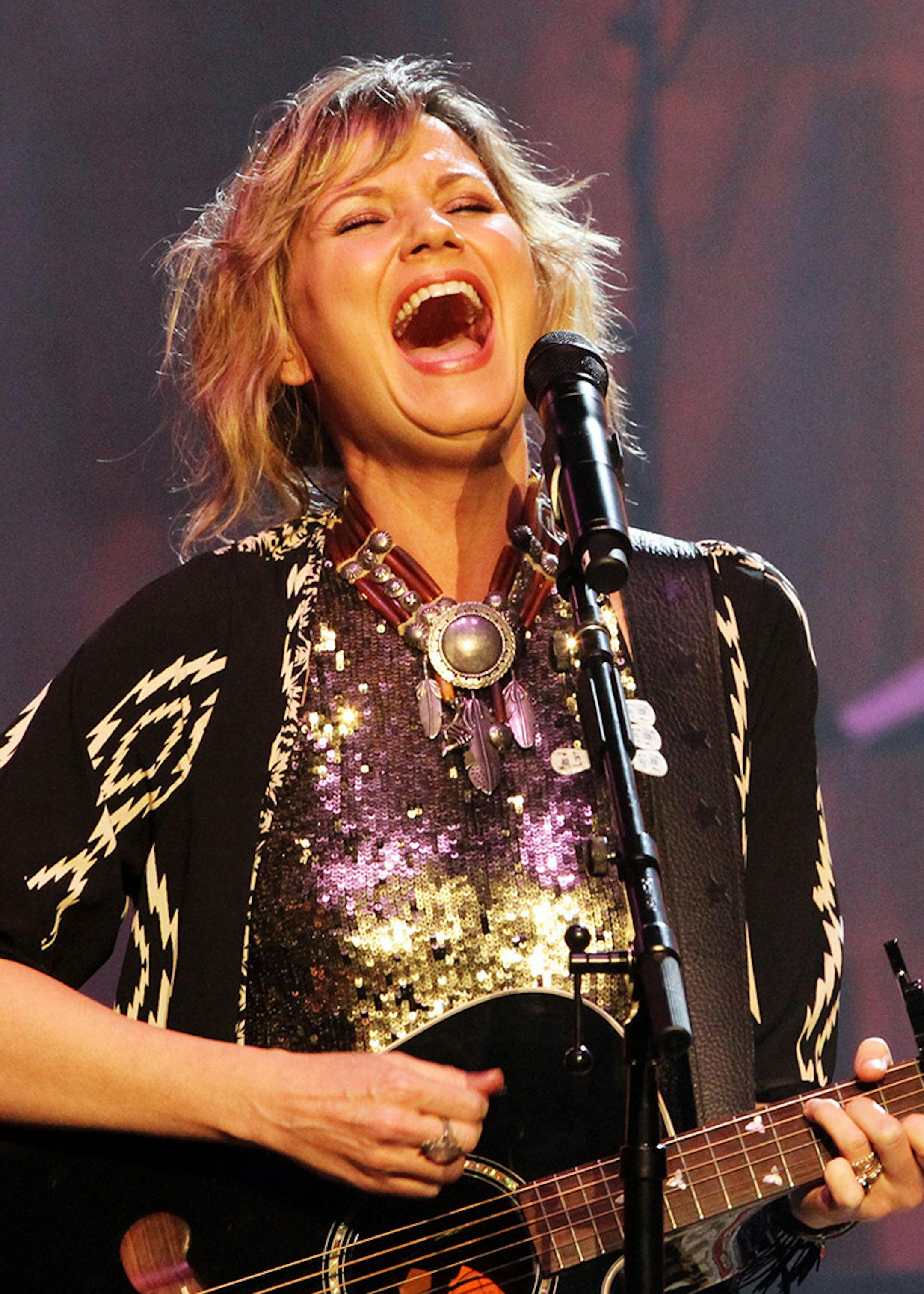 Jennifer Nettles of Sugarland performing at The Fabulous Fox Theatre on Saturday, Feb. 22, 2014, in Atlanta. (Photo by Robb D. Cohen/Invision/AP) ORG XMIT: INVW