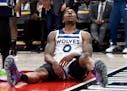 Minnesota Timberwolves guard Jeff Teague reacts to an official's call during the second half of the team's NBA basketball game against the Portland Tr