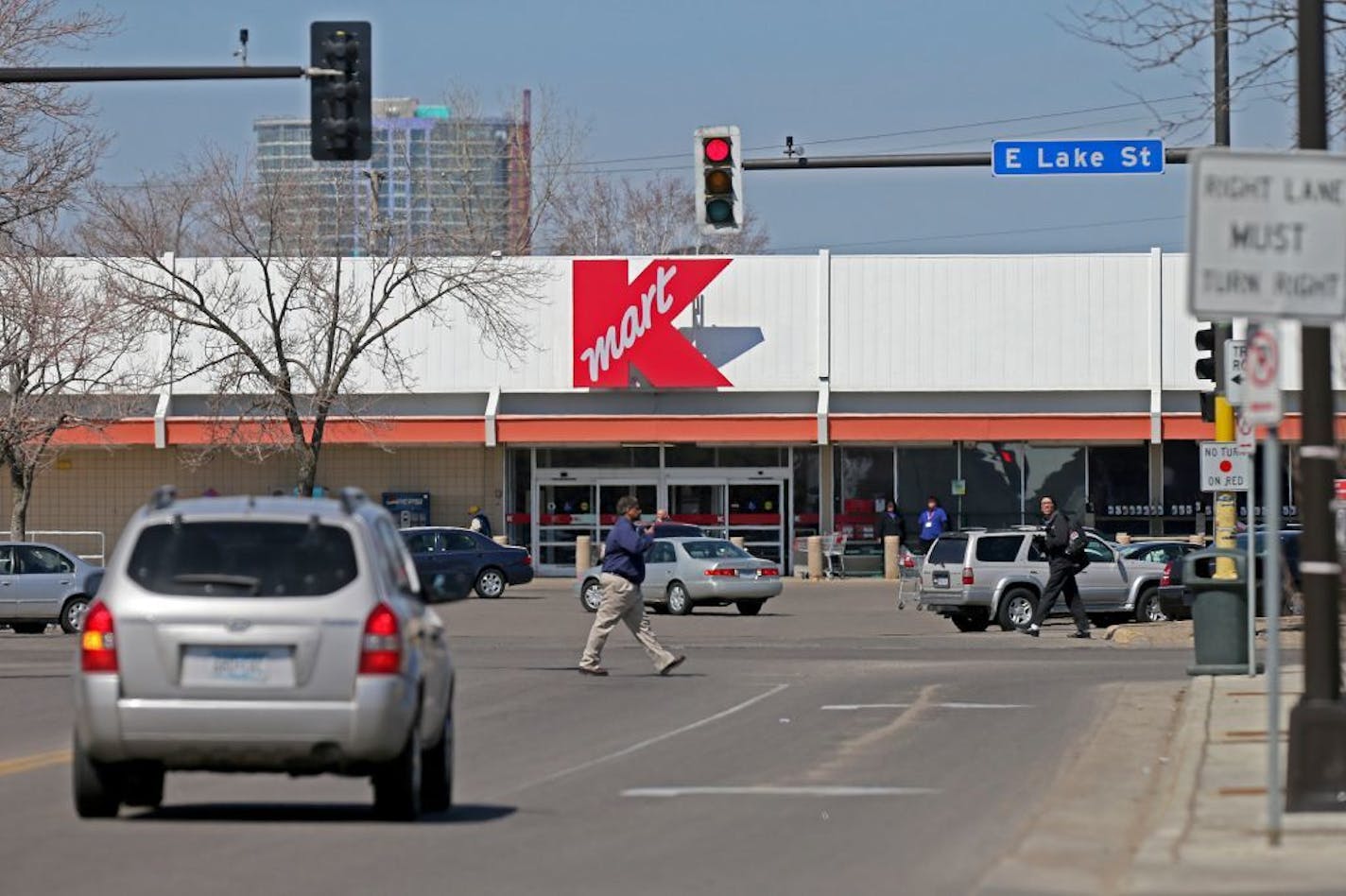 Pedestirans made their way to and near the Kmart near the corner of Nicollet and Lake Streets, Tuesday, April 15, 2014 in Minneapolis, MN. Minneapolis officials discussed Tuesday a redevelopment plan that would reverse one of the biggest planning blunders in city history: closing Nicollet Avenue at Lake Street.