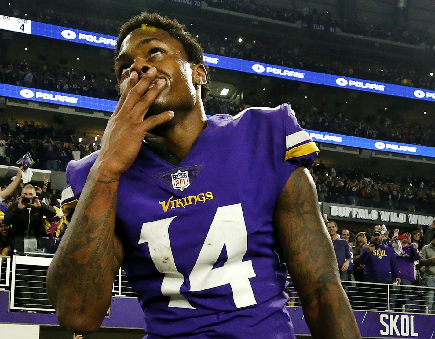 Vikings receiver Stefon Diggs (14) celebrated at the end of the game. Diggs scored a 61-yard touchdown to win the game. Minnesota beat New Orleans by a final score of 29-24. ] CARLOS GONZALEZ &#x2022; cgonzalez@startribune.com - Minneapolis, MN - January 14 2018, US Bank Stadium, NFL, NFC Divisional Playoff, Minnesota Vikings vs. New Orleans Saints ORG XMIT: MIN1801141951353806 ORG XMIT: MIN1801151735204039 ORG XMIT: MIN1912211637360296