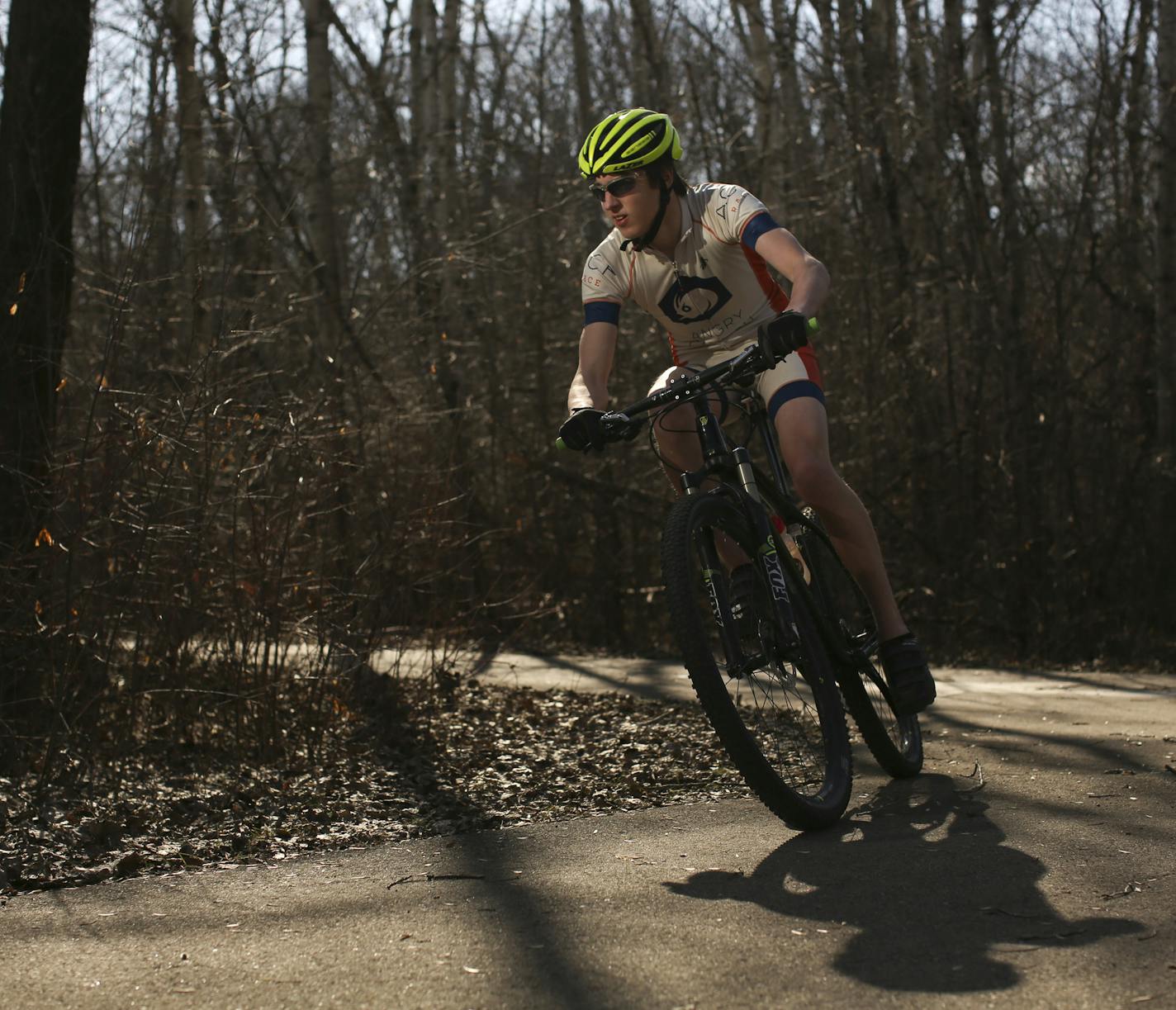 Max Ellingson on his mountain bike in the wilds of Edina's Bredesen Park Thursday afternoon. ] JEFF WHEELER &#x201a;&#xc4;&#xa2; jeff.wheeler@startribune.com Max Ellingson's passion for mountain biking isn't limited by his cerebral palsy. The Edina High School junior compete's on his school's mountain bike team and rides competitively all summer as well. Thursday afternoon, April 10, 2014 he did some intervals at Bredesen Park in Edina so he could be photographed in the saddle.