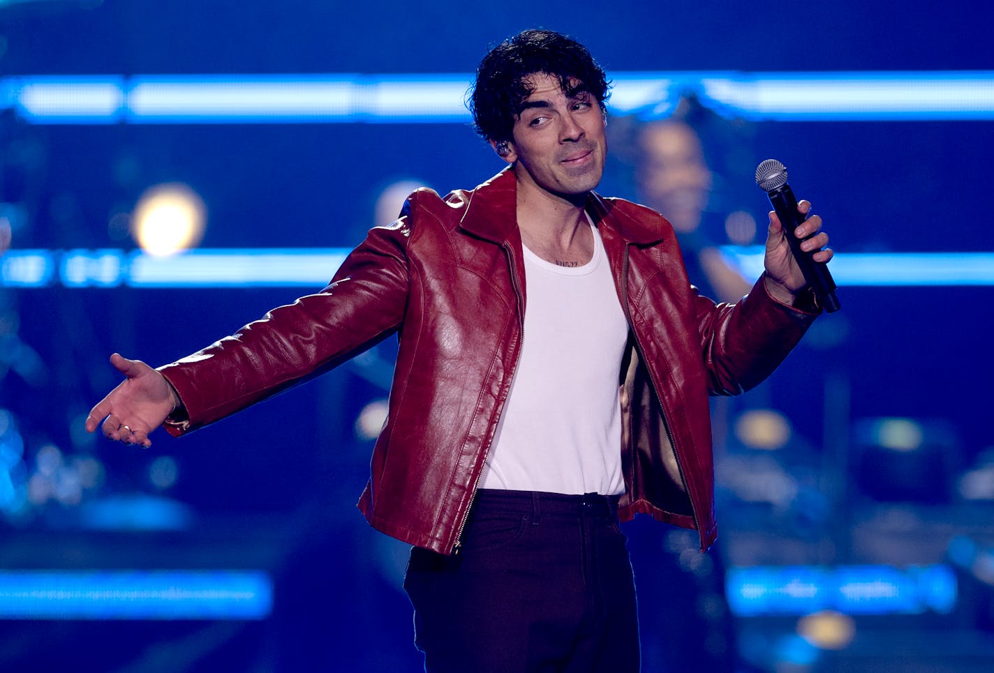 Joe Jonas performs with the Jonas Brothers.