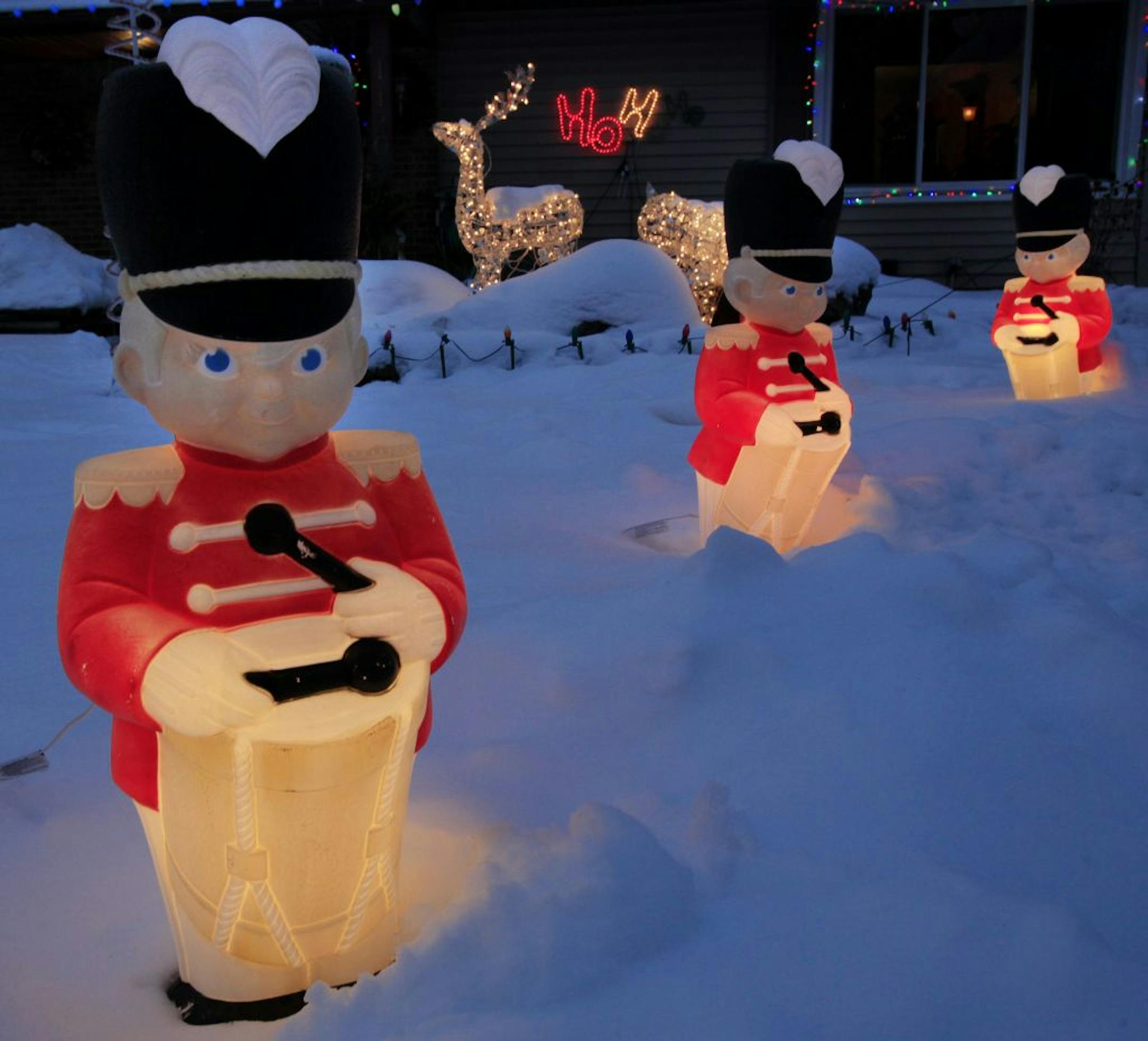 Michael and Shirley Esch deck their house out with thousands of lights every year and even dress up like Santa and Mrs. Claus to collect food donations for the hungry in Burnsville, MN on December 12, 2012.