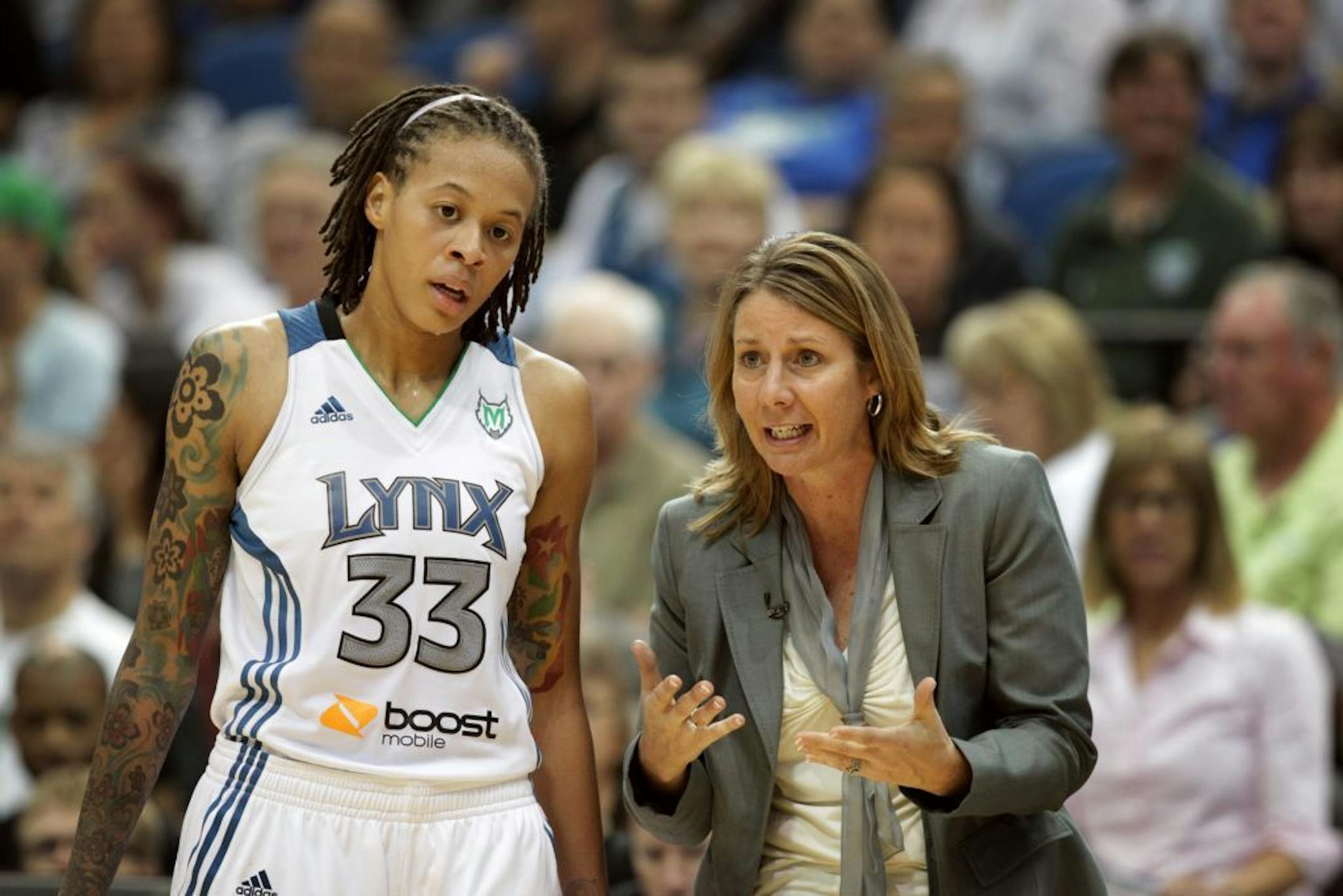 Lynx coach Cheryl Reeve talked with Seimone Augustus during a game in May 2012.