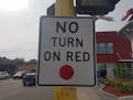 This "No Turn on Red" with a red dot at the bottom at the intersection of Penn Avenue and West Broadway in north Minneapolis is the new standard for t