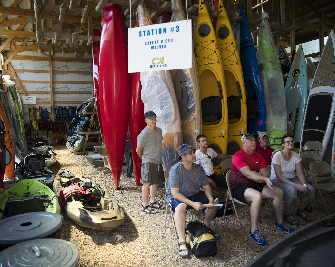 A group of people watched safety video before their trip at CW Outfitting in Clearwater, Minn., on July 7, 2017. ] RENEE JONES SCHNEIDER &#x2022; renee.jones@startribune.com