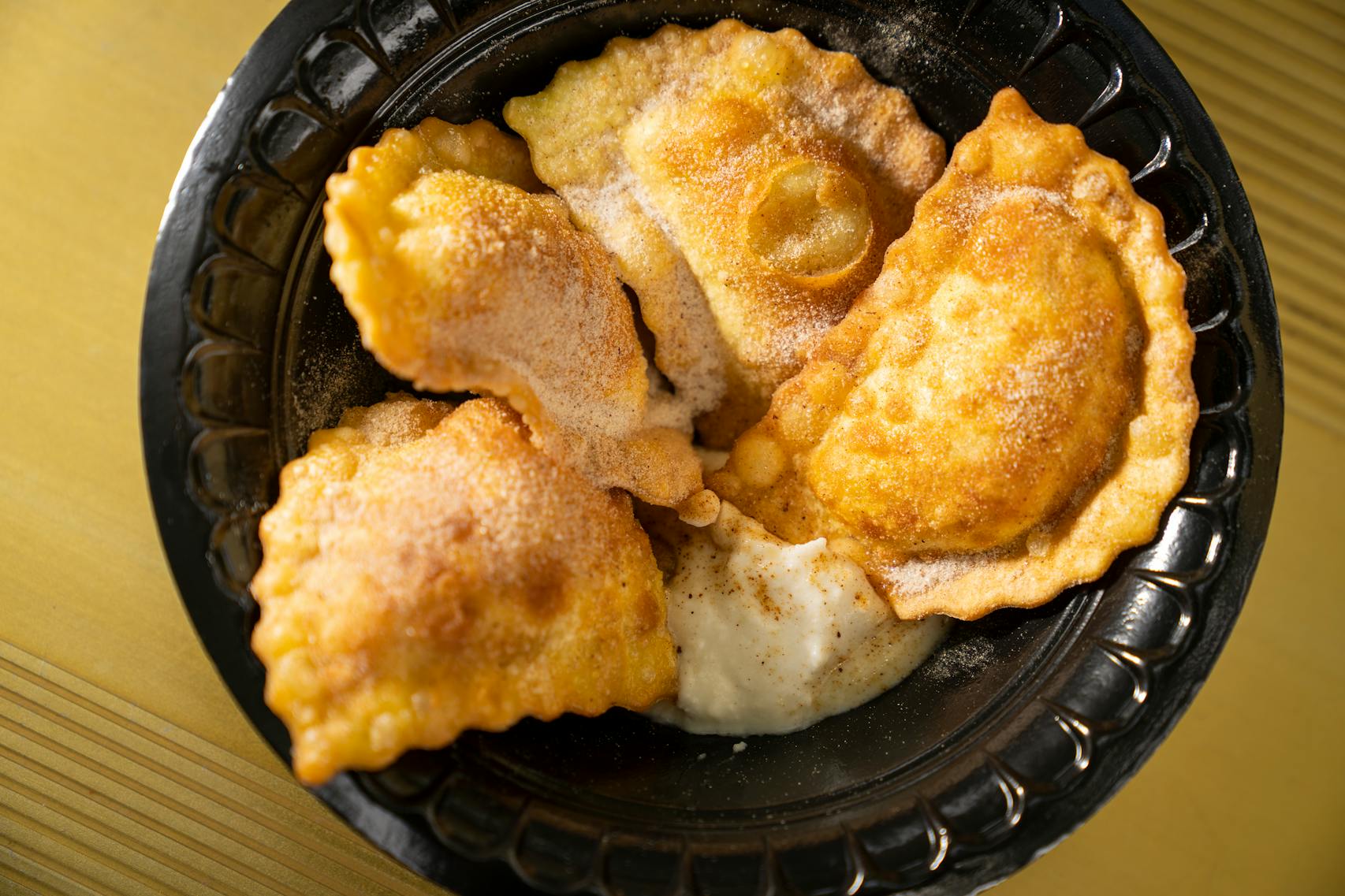 Fried Butternut Squash Ravioli from Oodles of Noodles. The new foods of the 2023 Minnesota State Fair photographed on the first day of the fair in Falcon Heights, Minn. on Tuesday, Aug. 8, 2023. ] LEILA NAVIDI • leila.navidi@startribune.com