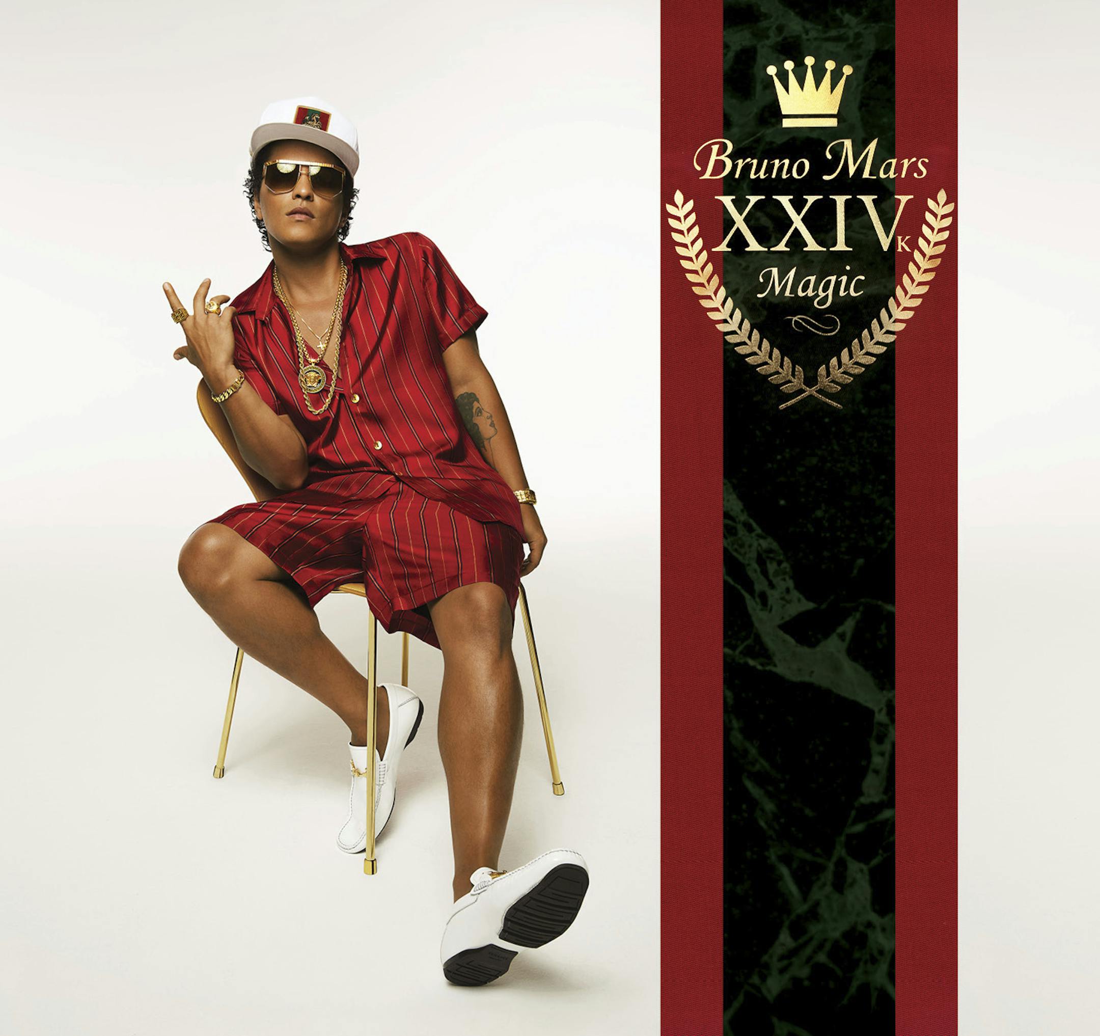 This cover image released by Atlantic Records shows, "24K Magic," the latest release by Bruno Mars. Mars, 31, said the album was inspired by his love for R&B acts like New Edition, Boyz II Men and Jodeci. (Atlantic Records via AP)