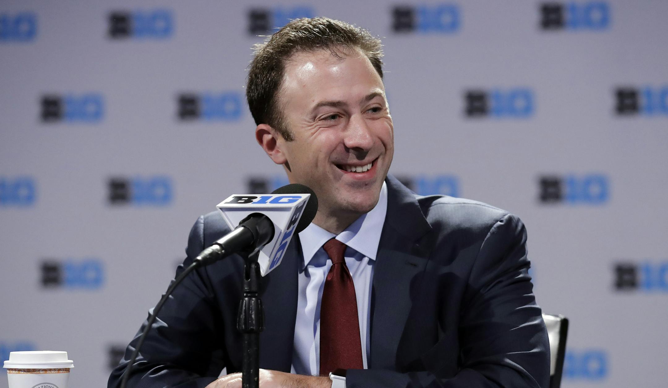 Minnesota head coach Richard Pitino smiles as he speaks at a press conference during Big Ten NCAA college basketball media day Thursday, Oct. 11, 2018, in Rosemont, Ill. (AP Photo/Nam Y. Huh)