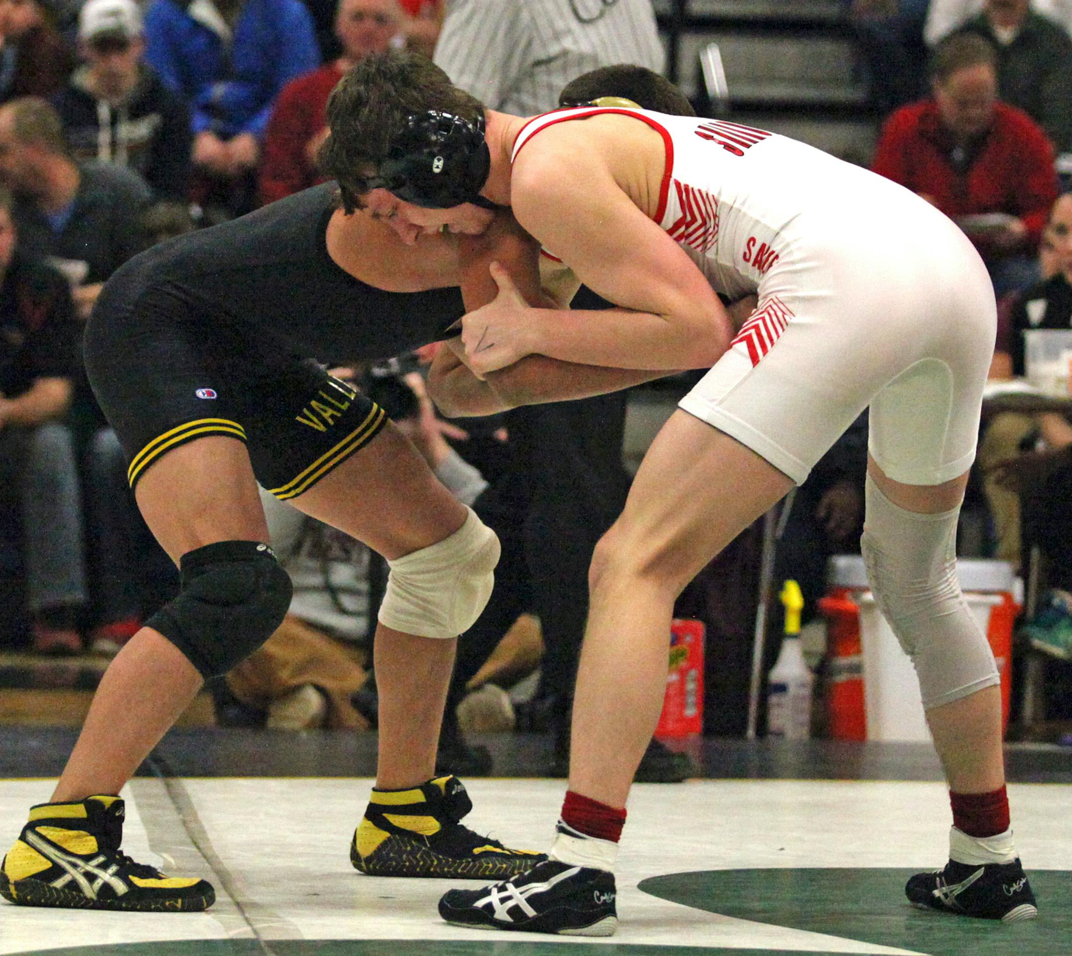 Shakopee Sabers Brent Jones and Apple Valley Eagles Sebas Swiggum wrestling. ] XAVIER WANG &#x2022; xavier.wang@startribune.com Game actions from 2017 Section 2AAA Team Wrestling Tournament final section between the Shakopee Sabers and Apple Valley Eagles Friday. Feb, 17. 2017 at Rosemount High School in Rosemount, Minnesota.
