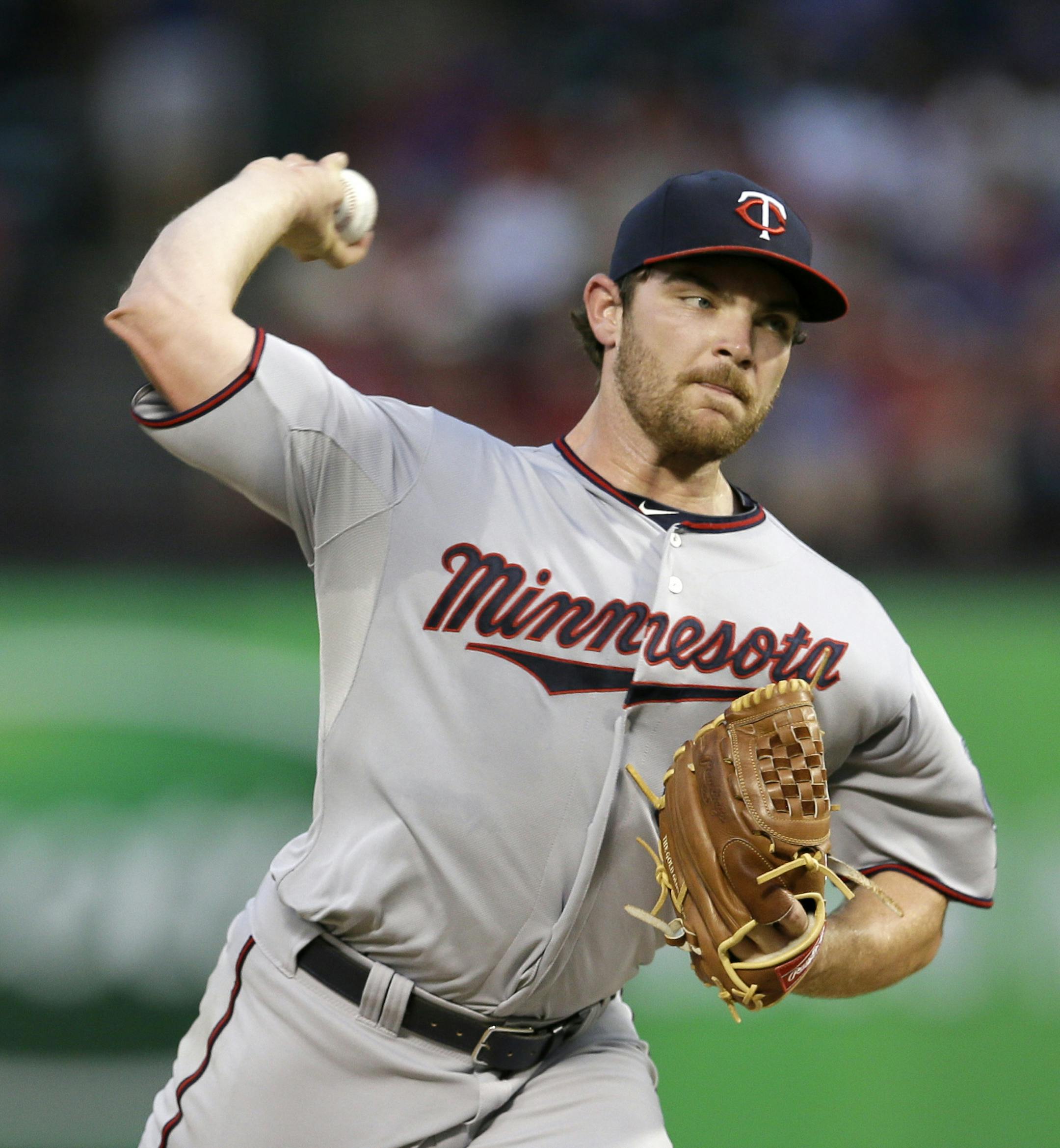 Minnesota Twins starting pitcher Liam Hendriks (62) delivers to the Texas Rangers in the third inning of a baseball game, Friday, Aug. 30, 2013, in Arlington, Texas. (AP Photo/Tony Gutierrez)
