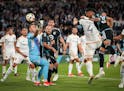 Minnesota United midfielder Kervin Arriaga (33) heads the ball past LA Galaxy goalkeeper John McCarthy for a goal to tie the game 2-2 in the second ha