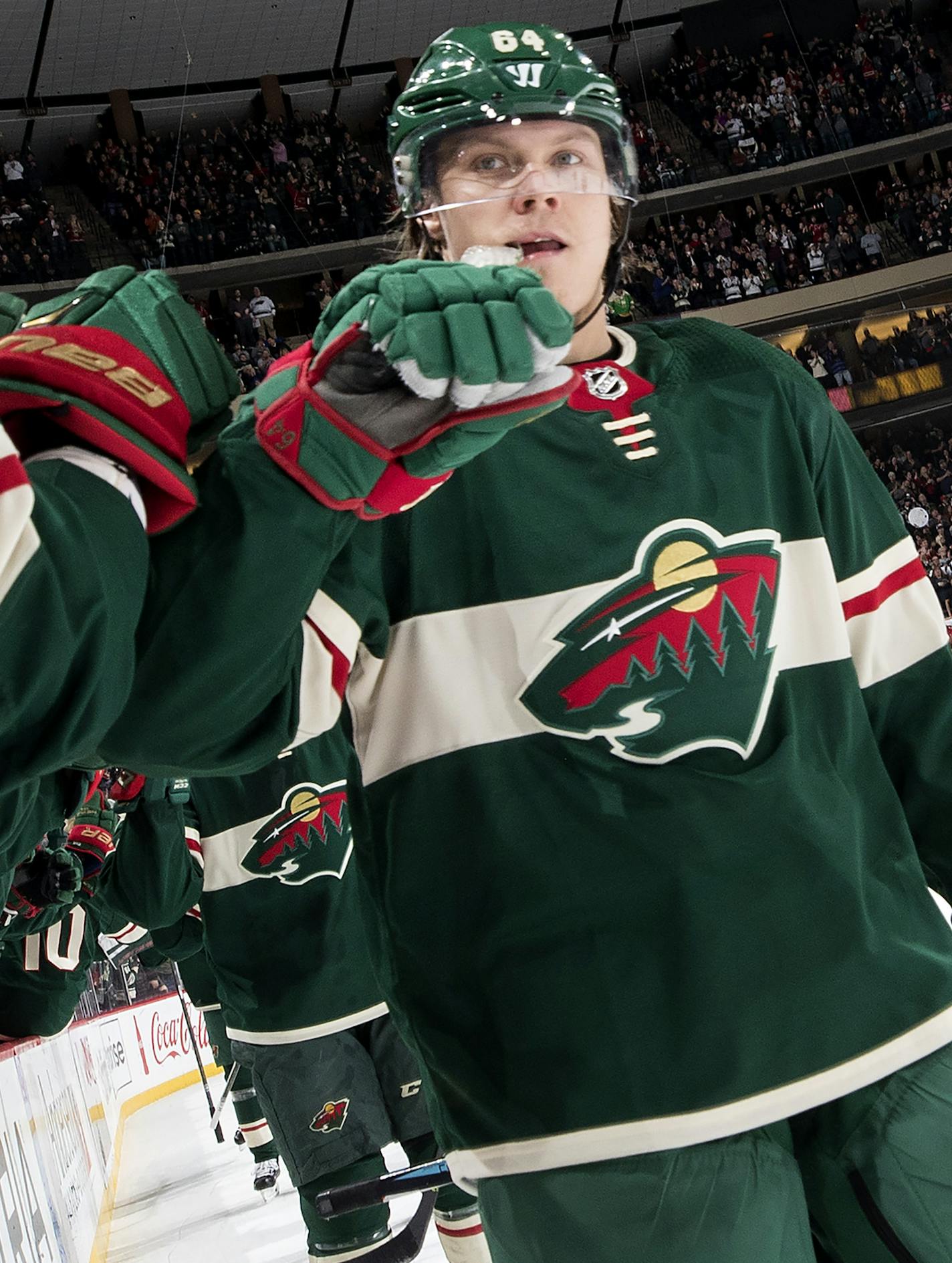 Mikael Granlund (64) celebrated with teammates after scoring a goal in the second period. ] CARLOS GONZALEZ &#xef; cgonzalez@startribune.com - December 27, 2017, St. Paul, MN, Xcel Energy Center, NHL, Hockey, Minnesota Wild vs. Dallas Stars