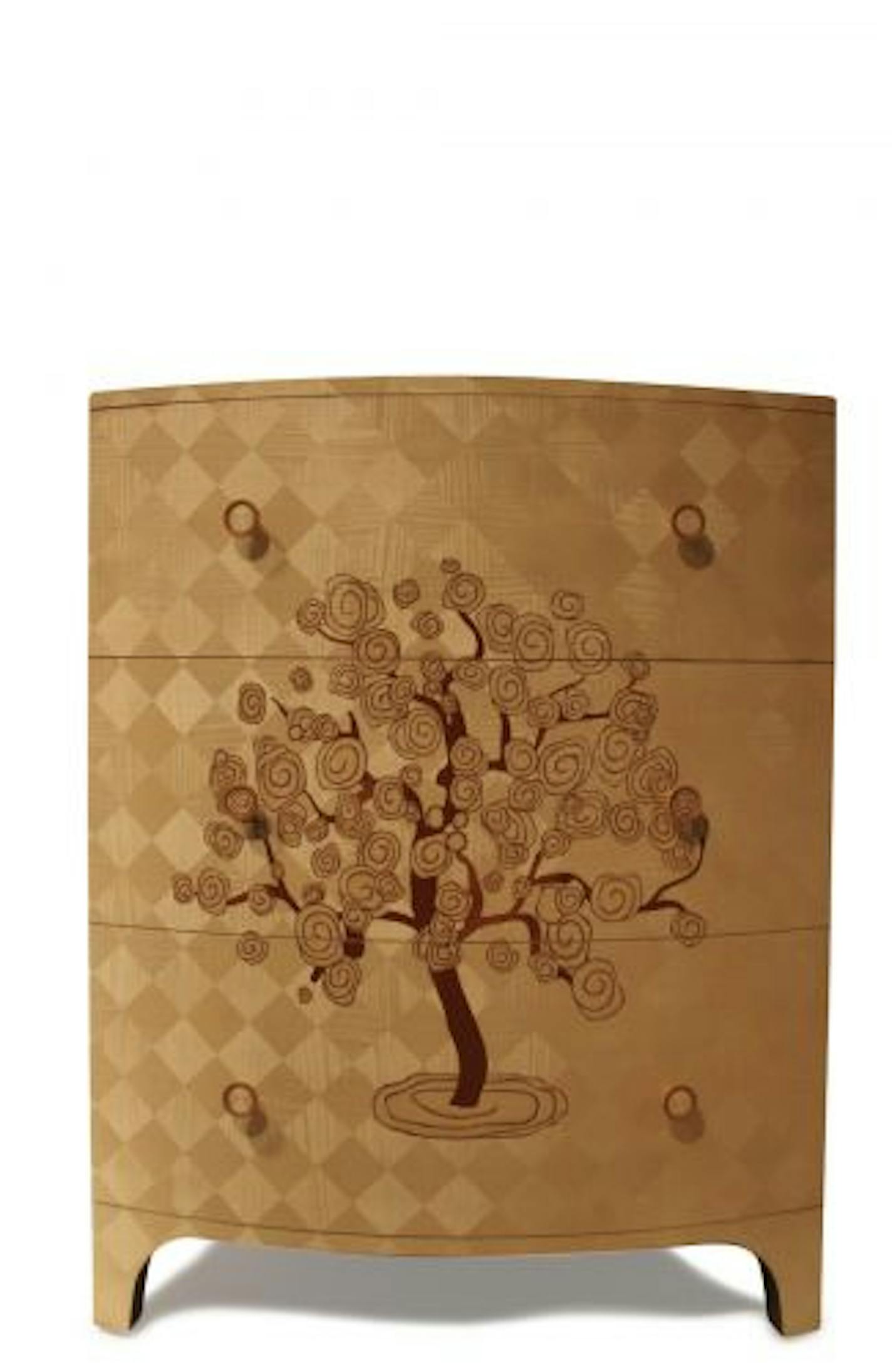 The blond sycamore chest from the Keno brothers has a whimsical inlay.