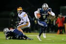 Champlin Park quarterback Jaice Miller (4) was offered a preferred walk-on spot by the Gophers a few days before leading the Rebels into the Prep Bowl