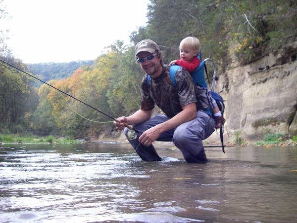 Justin Watkins fishes Whitewater State Park with son Danny.