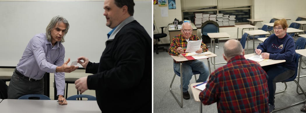 At left, David Johnson takes a slip of paper to write in his presidential favorite at the start of a precinct meeting Tuesday in Hastings. At right, Terry and Margaret Flower run their precinct meeting as GOP caucus-goers met a week before Super Tuesday at Hastings High School. 