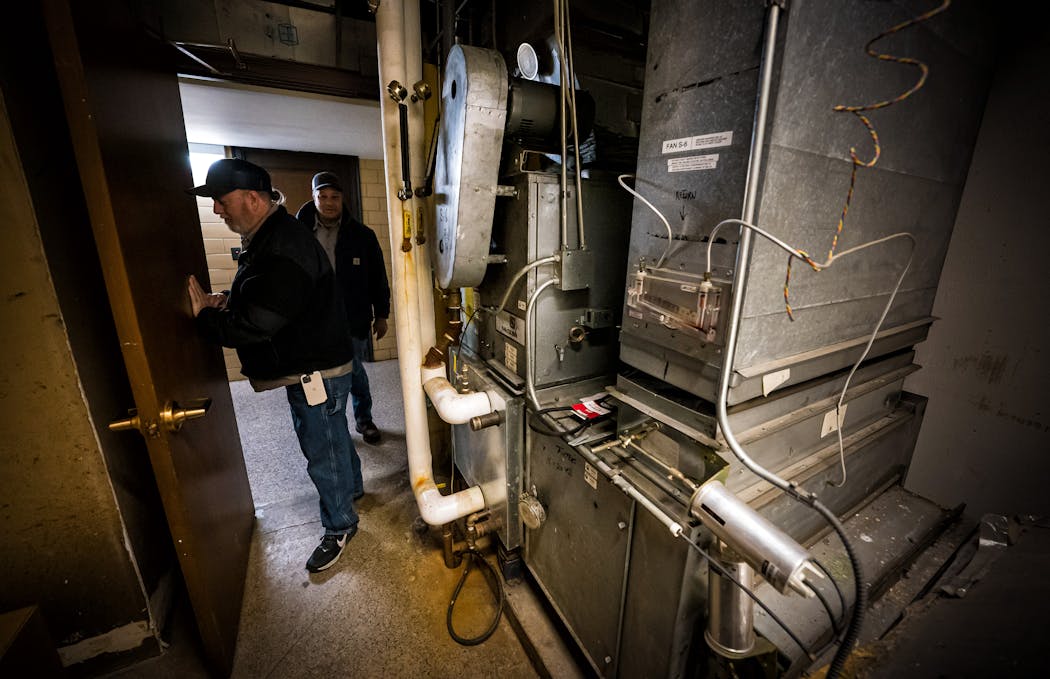 Last December, Capitol engineers David Albien and Daren Perteet checked air handlers for committee rooms at the State Office Building, many of which were replaced in the 1980s when the building was last renovated.