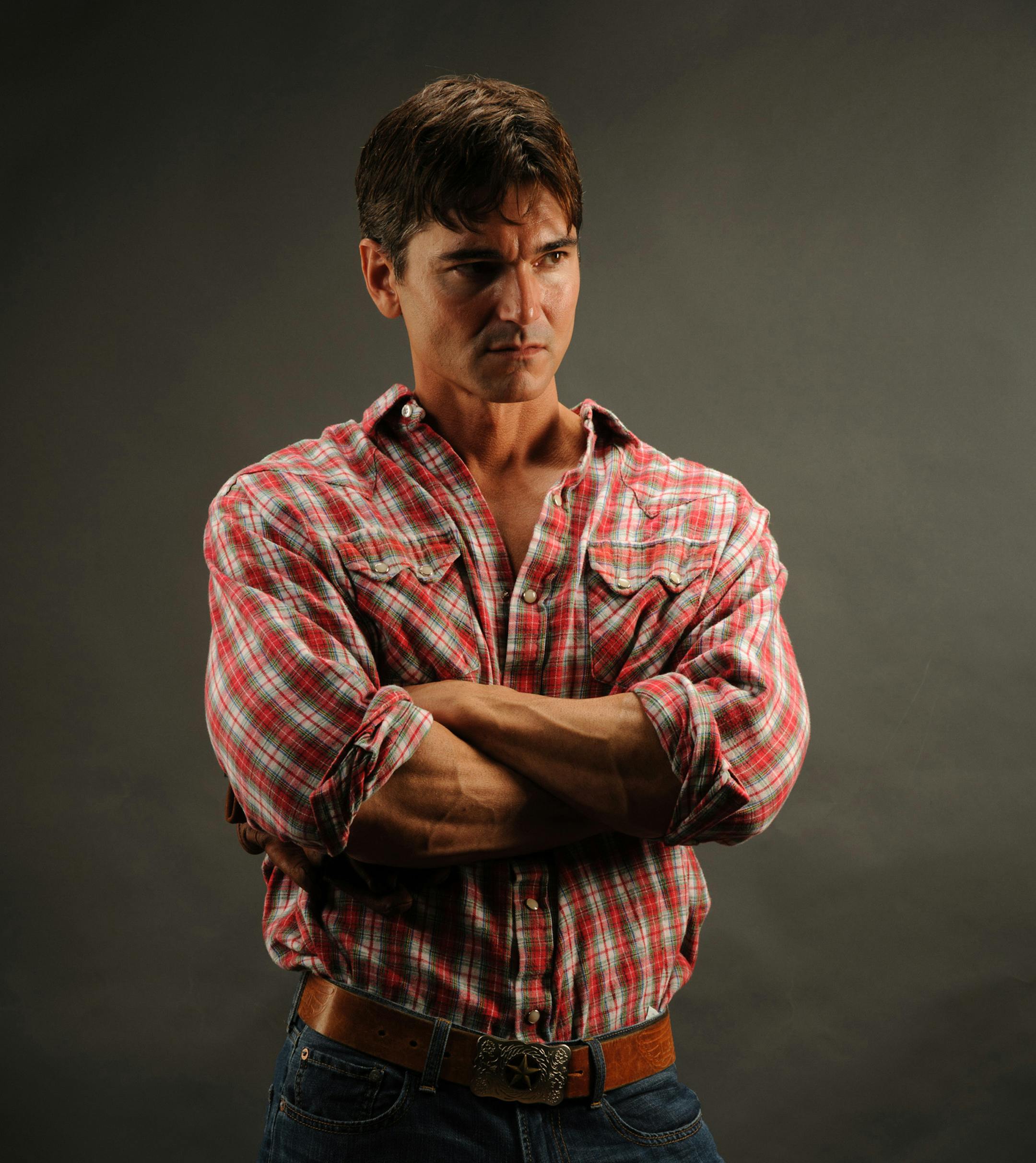 Model Jason Aaron Baca poses for a romance novel cover. Baca has appeared on the covers of more than 400 romance novels. (Portia Shao)